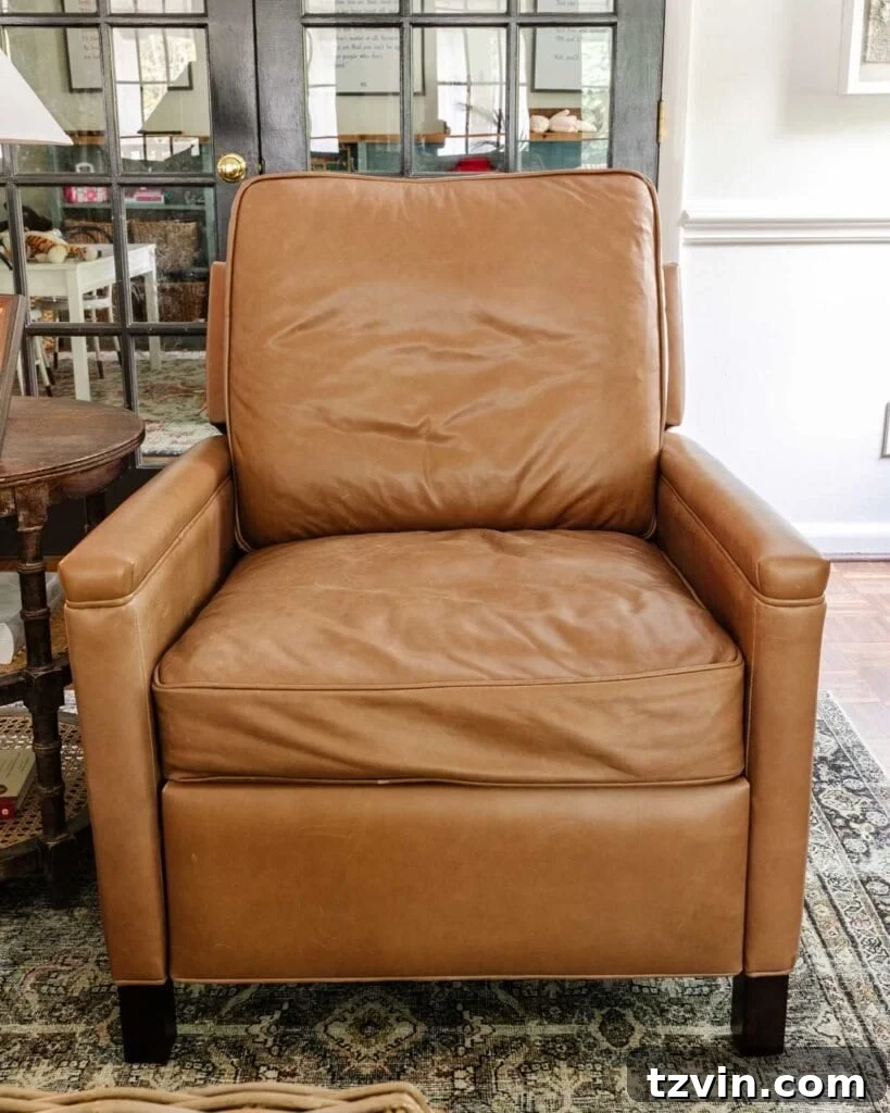 Pottery Barn Leather Recliner: Two Years Later, An Honest Appraisal 10 Detailed view of the luxurious down blend cushions on a Pottery Barn Tyler recliner, highlighting texture and comfort.