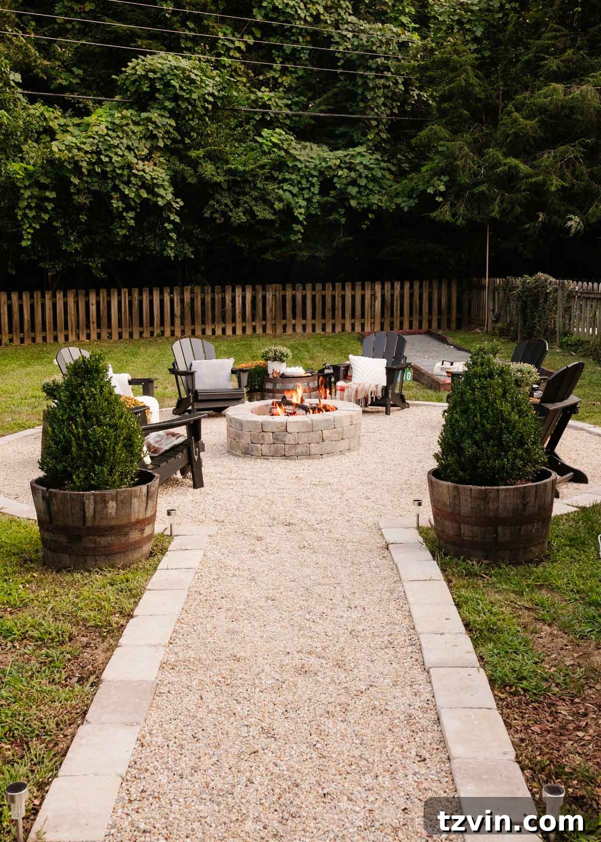 Ignite Autumn Nights: 8 Fire Pit Decor Ideas for Your Backyard 5 Beautifully decorated backyard fire pit area ready for fall entertaining