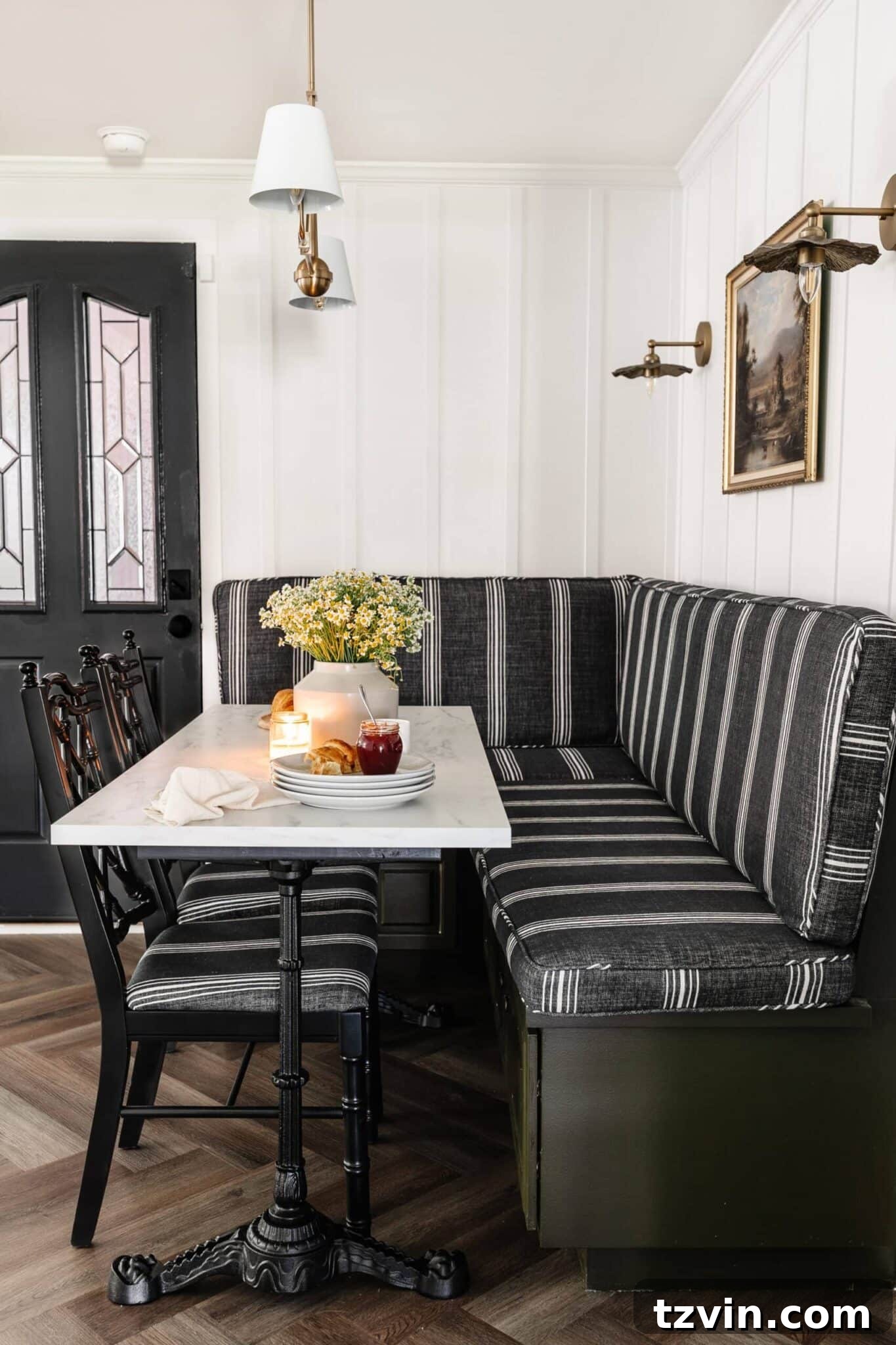 Designers' Go-To Off-White Paint Shades 14 breakfast nook banquette with marble dining table painted in an off-white color