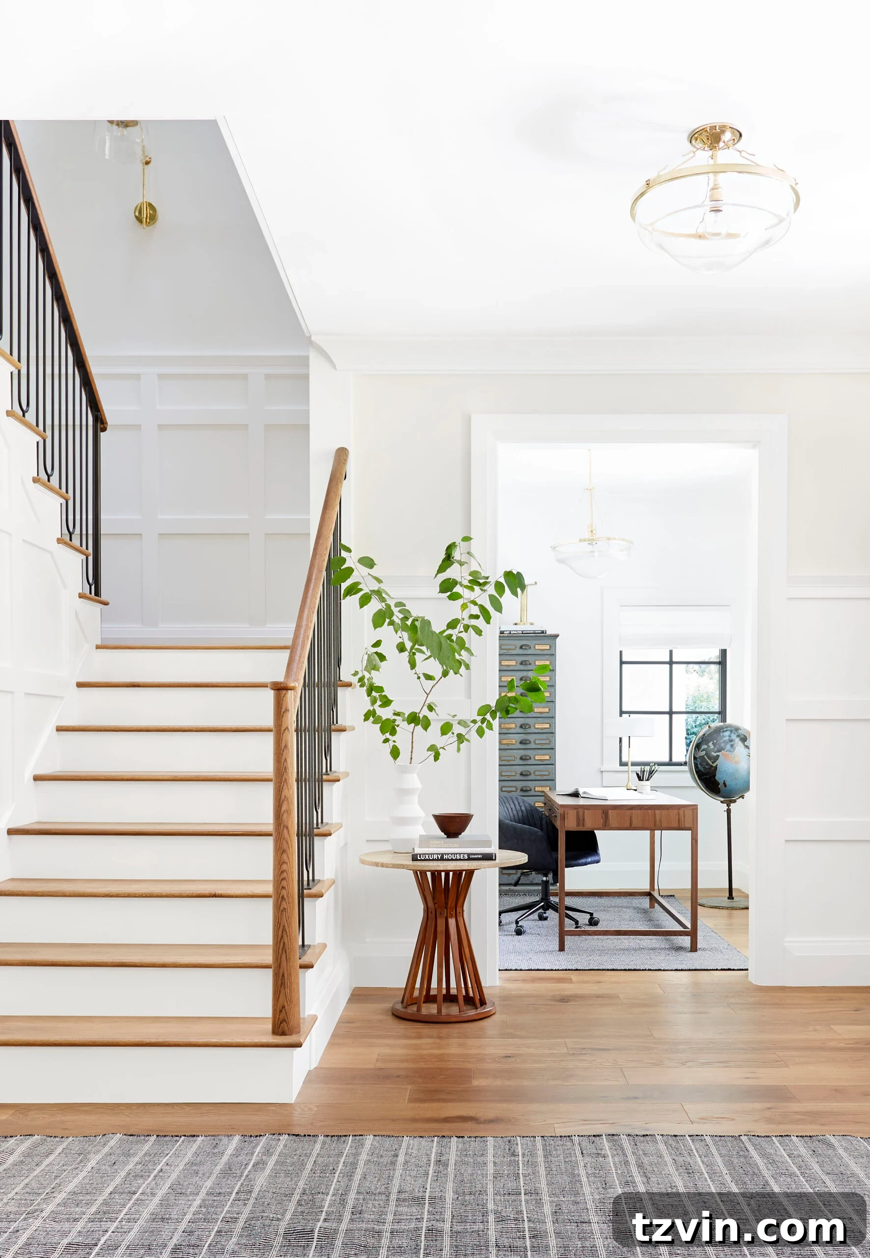 Designers' Go-To Off-White Paint Shades 10 Sherwin Williams Oyster White on an elegant staircase