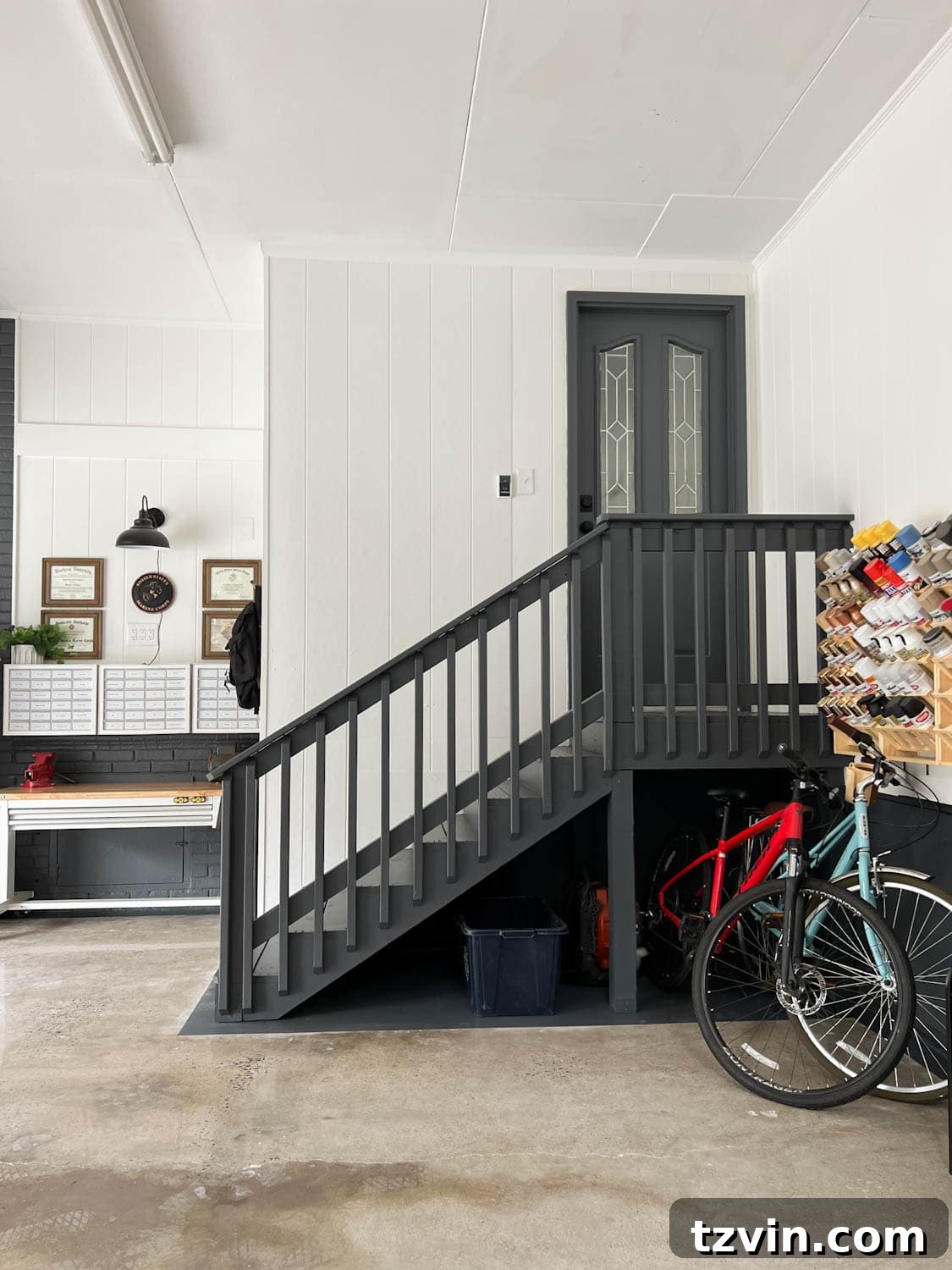 Paint Storage Perfection: Closet Organization Hacks 13 organized garage with bike storage, paint storage, and tool storage