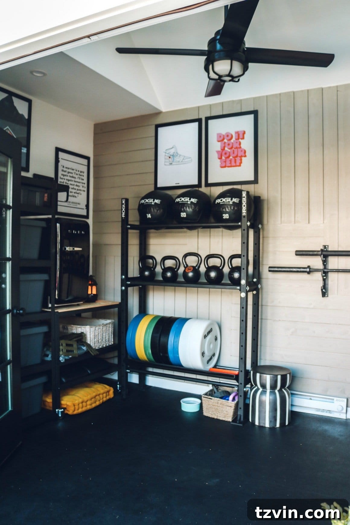 Smart Home Gym Solutions for Basements Garages and Sheds 6 home gym featuring motivational wall quotes and industrial shelving