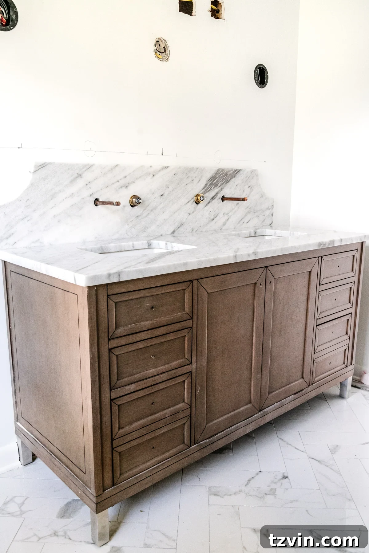 Bathroom Reno: Marble Scallop Splashback 7 Wood vanity with scalloped marble backsplash and herringbone tile