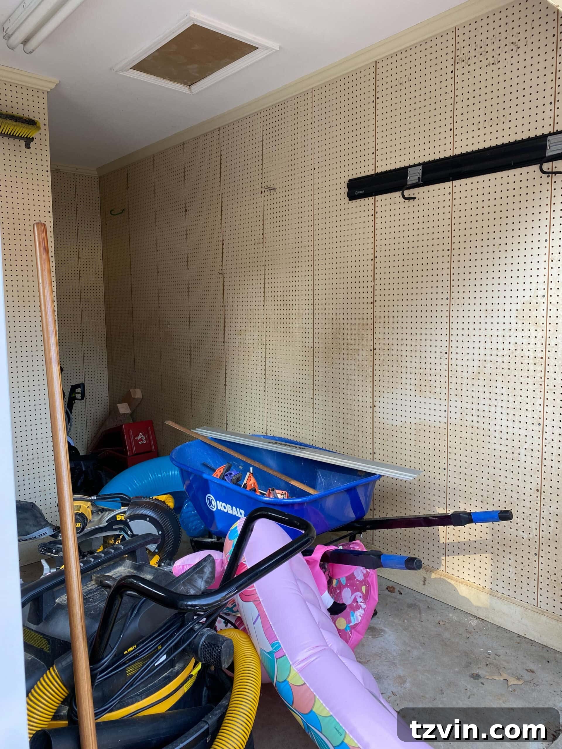 Faux Brick Gym Shed Upgrade 16 Before shot of the gym shed interior, showing a plain, undecorated space awaiting its transformation.