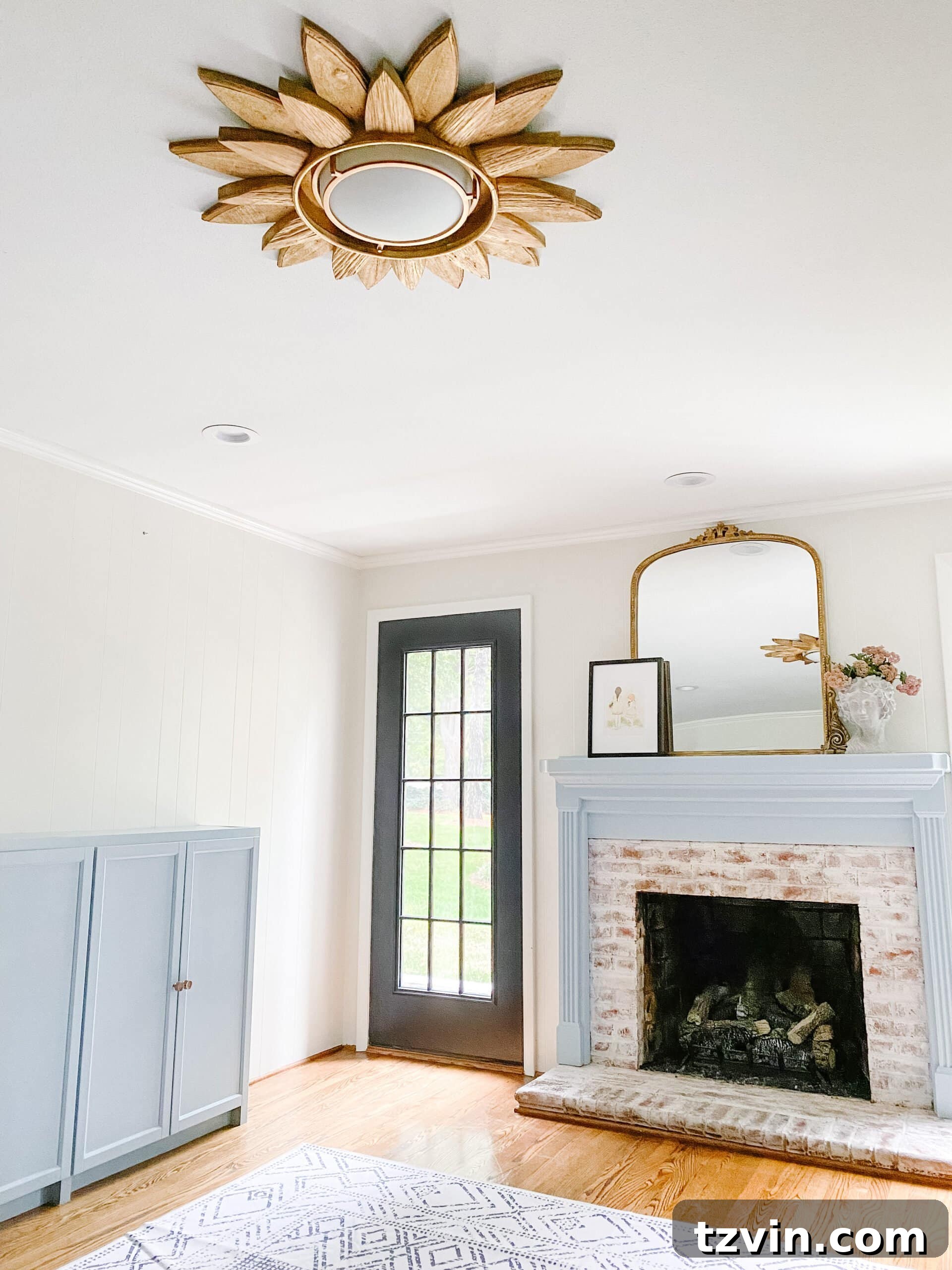 Sunburst Mirror Radiance: Your DIY Light Fixture 4 Stunning sunburst mirror DIY light fixture installed in a child's playroom