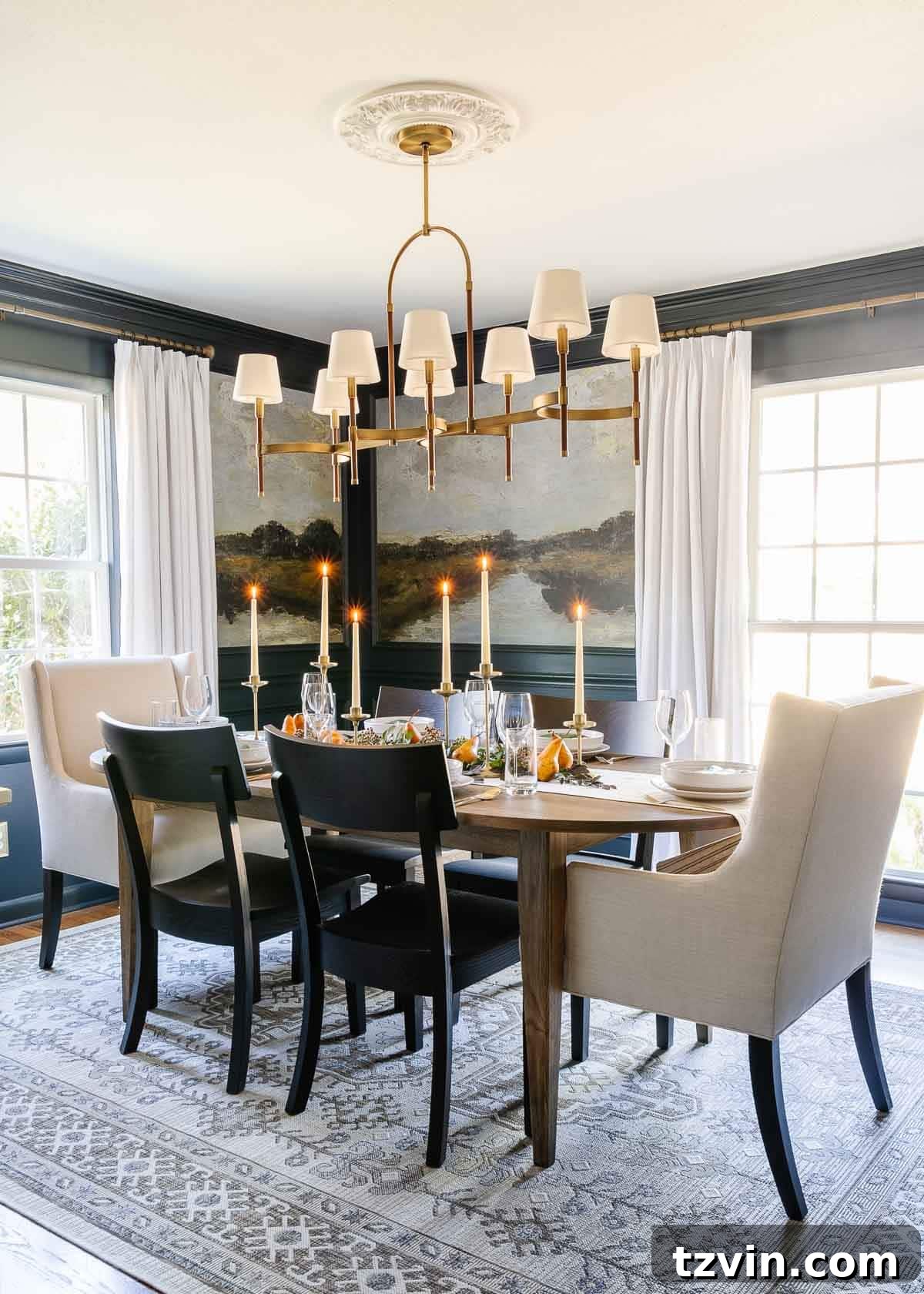 10-Minute Thanksgiving Table Makeover 2 Elegant navy dining room featuring antique scenic murals and a simply decorated Thanksgiving table with candles, fruit, and natural greenery.