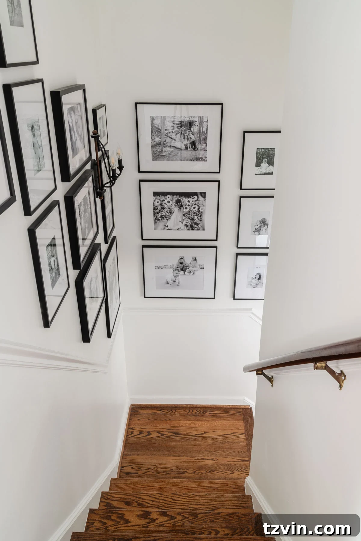 Foyer Fusion Classic Meets Contemporary 17 Another perspective of the family stairway gallery wall, highlighting its comprehensive display