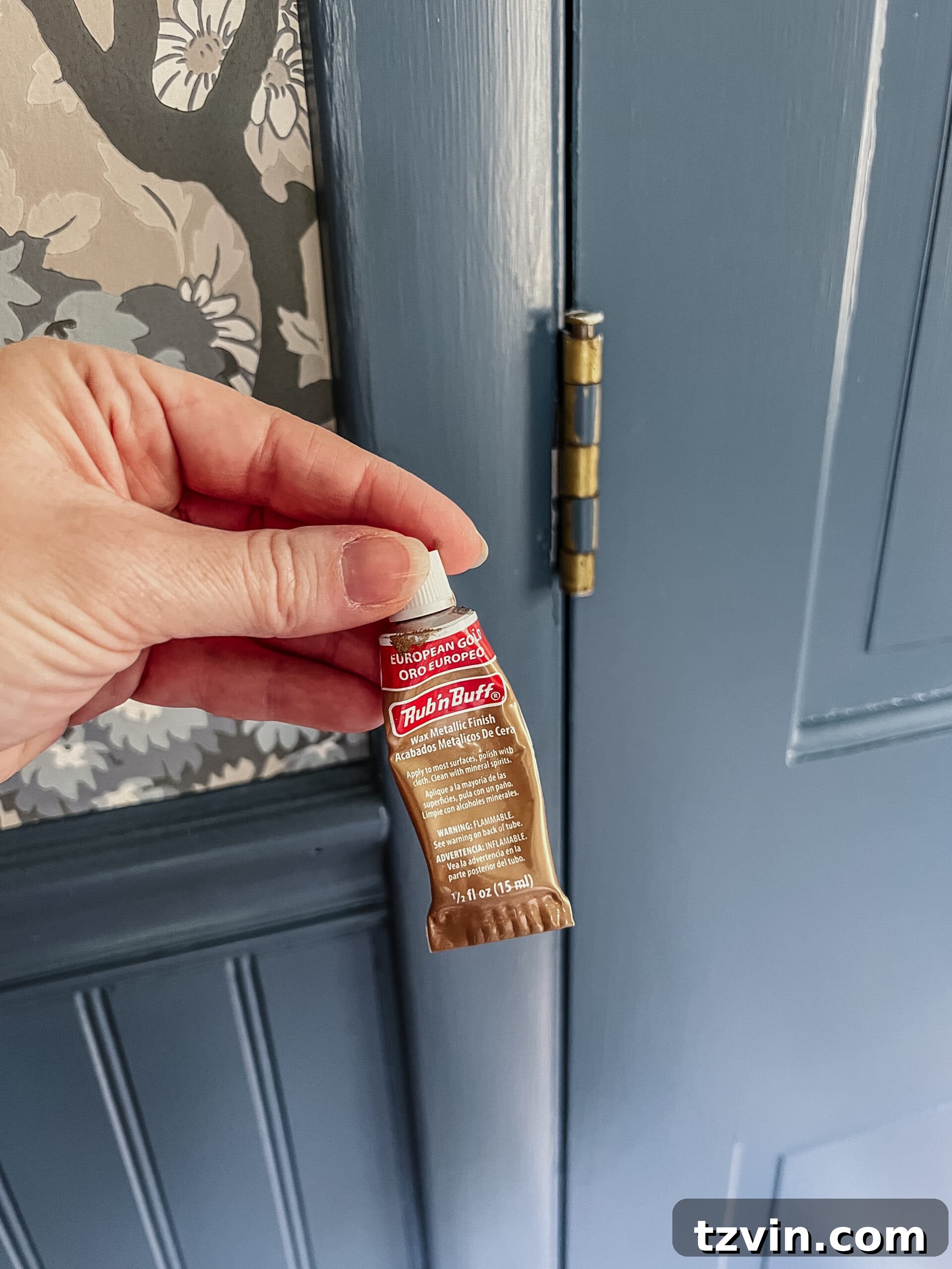 using Rub n Buff European Gold to brush on door hinges