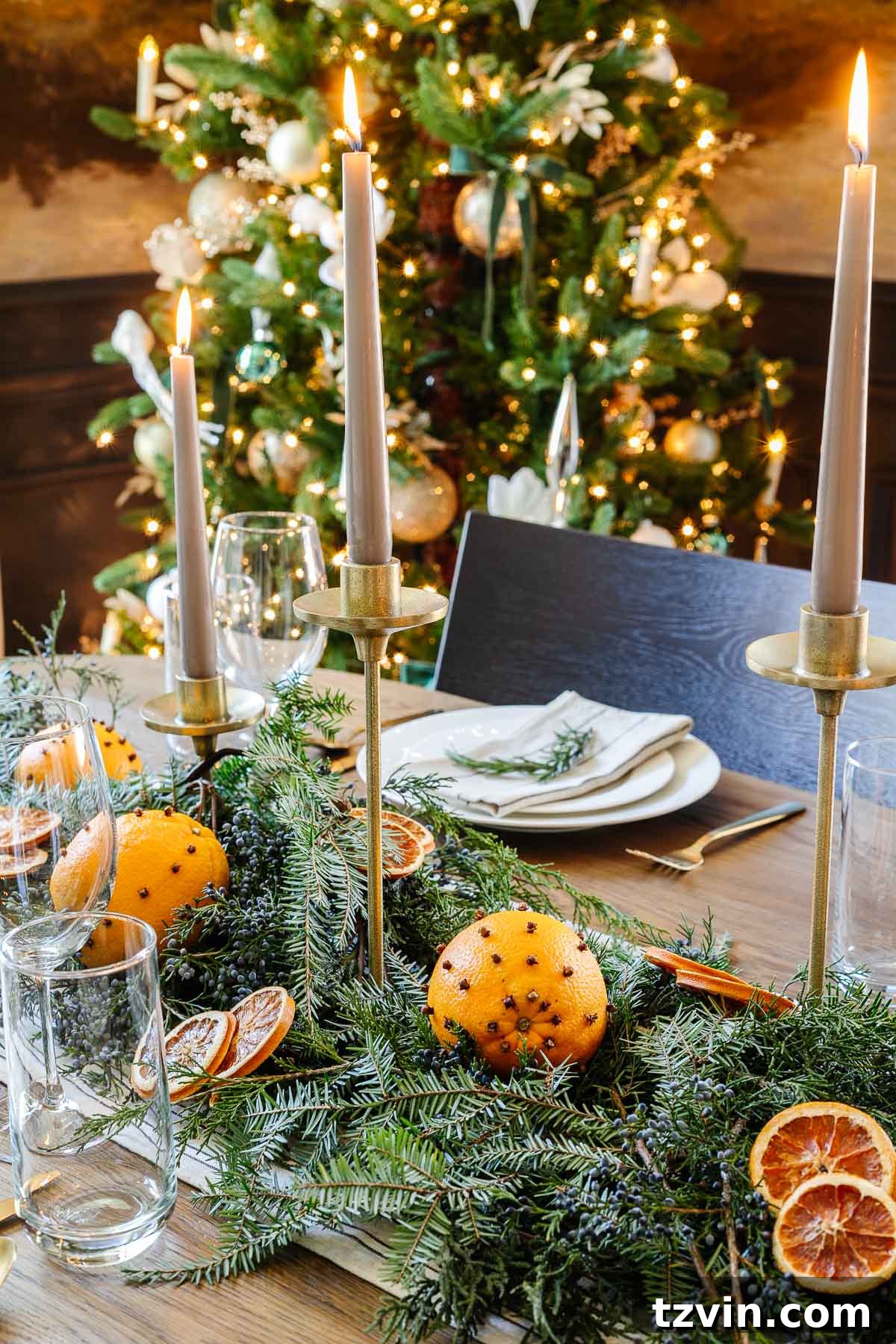 dried orange and evergreen Christmas table centerpiece
