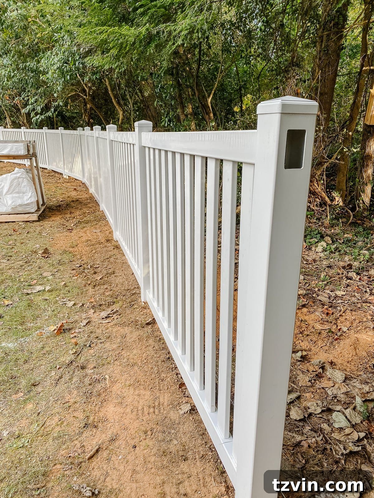 white vinyl fence installation with Ply Gem