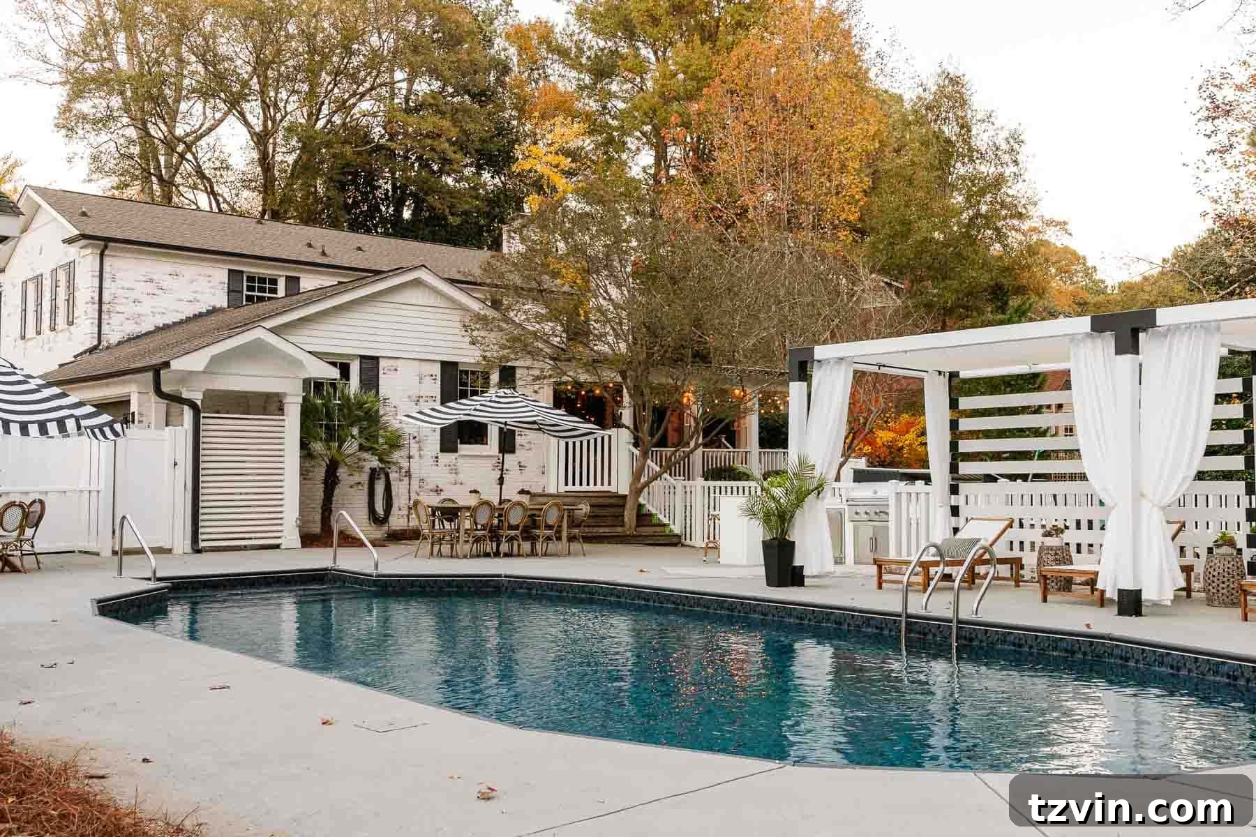 backyard pool after with pergola, new swimming pool liner, outdoor furniture, and outdoor kitchen