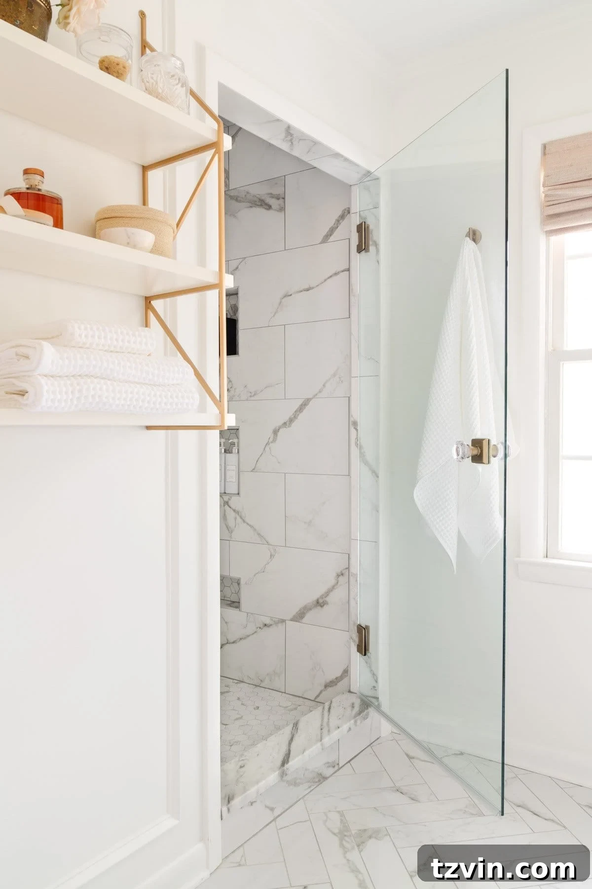 Step Inside Our Modern Vintage En Suite Bathroom Oasis 13 shower door with door knob and marble look tile
