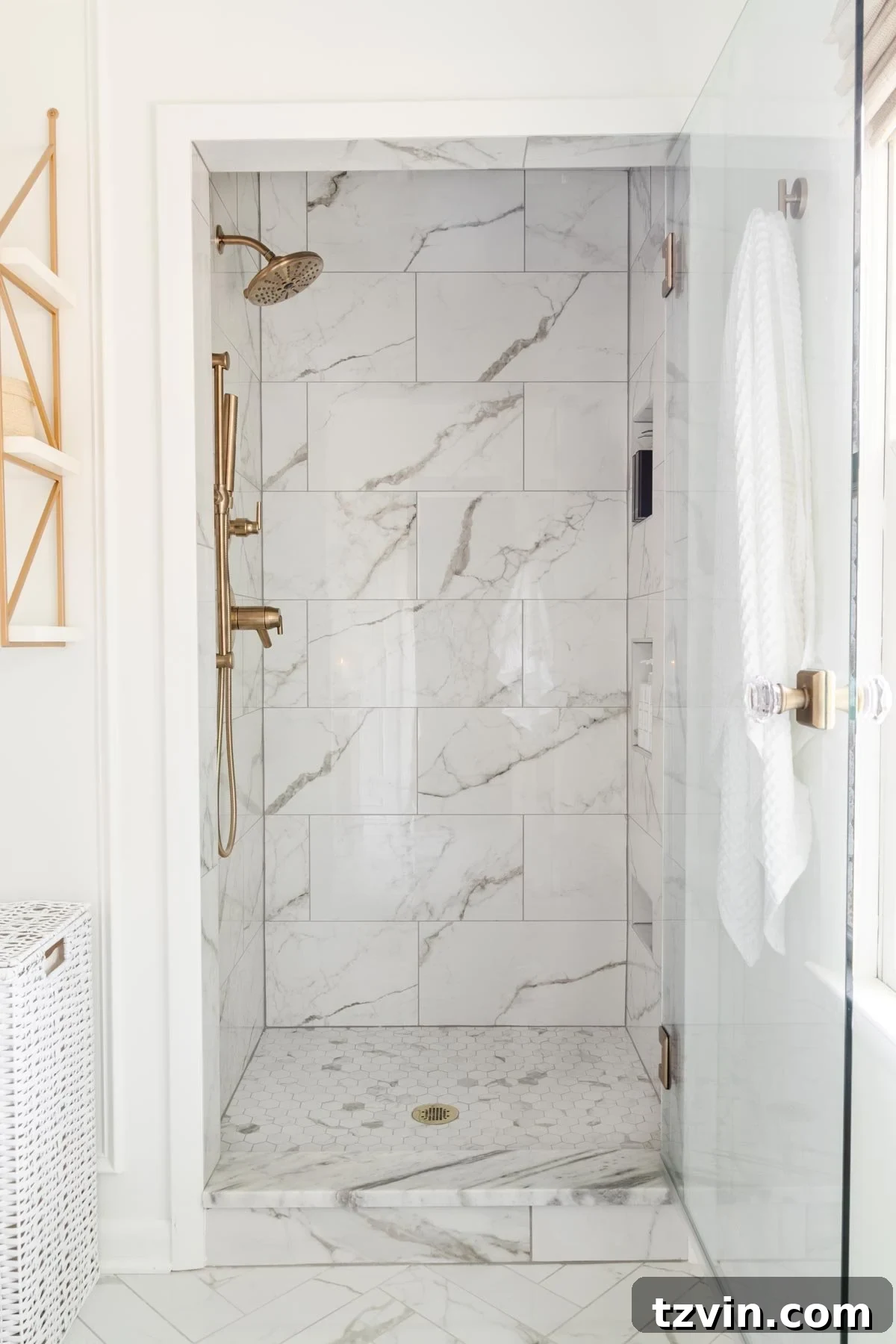 Step Inside Our Modern Vintage En Suite Bathroom Oasis 15 small shower with glass door and marble effect tile