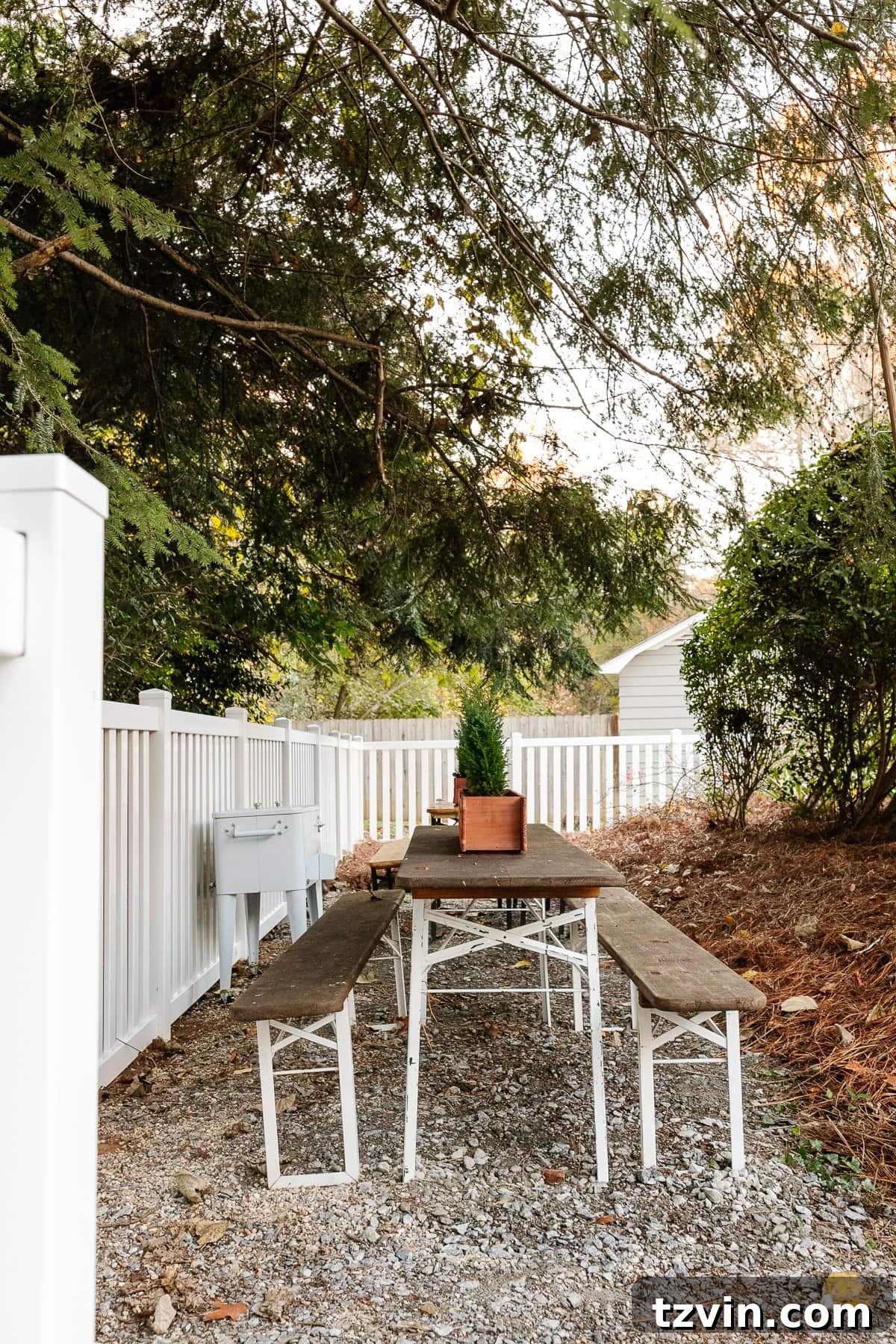 What We Really Paid for Our Backyard Oasis 24 backyard beer garden with refinished tables and gravel floor