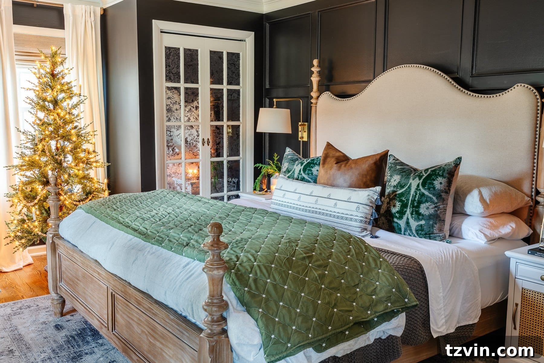 Christmas bedroom decor adding a Christmas tree and green bedding