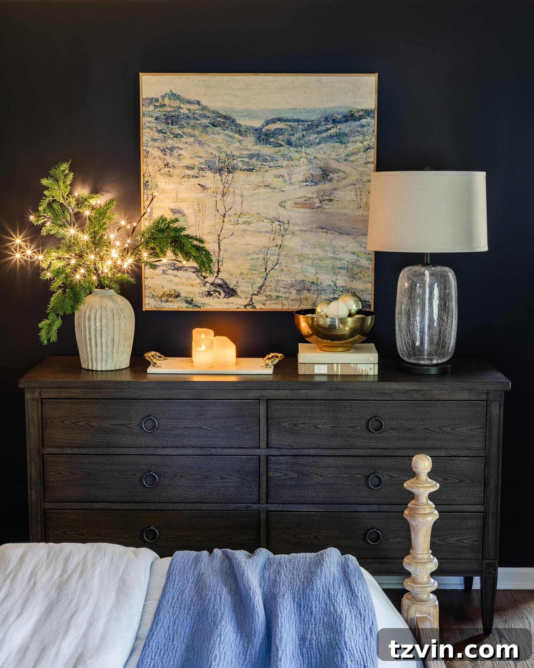 bedroom dresser Christmas decor with vase of pine branches, candles, and bowl of ornaments