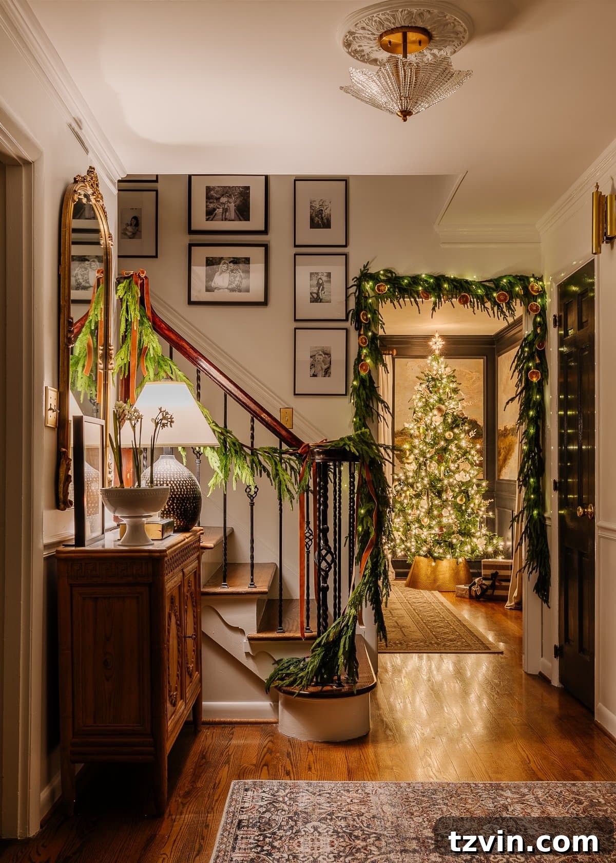 Holiday Glow Home Showcase 3 A cozy foyer decorated for Christmas, illuminated by the warm glow of candlelight, creating a welcoming and peaceful atmosphere.