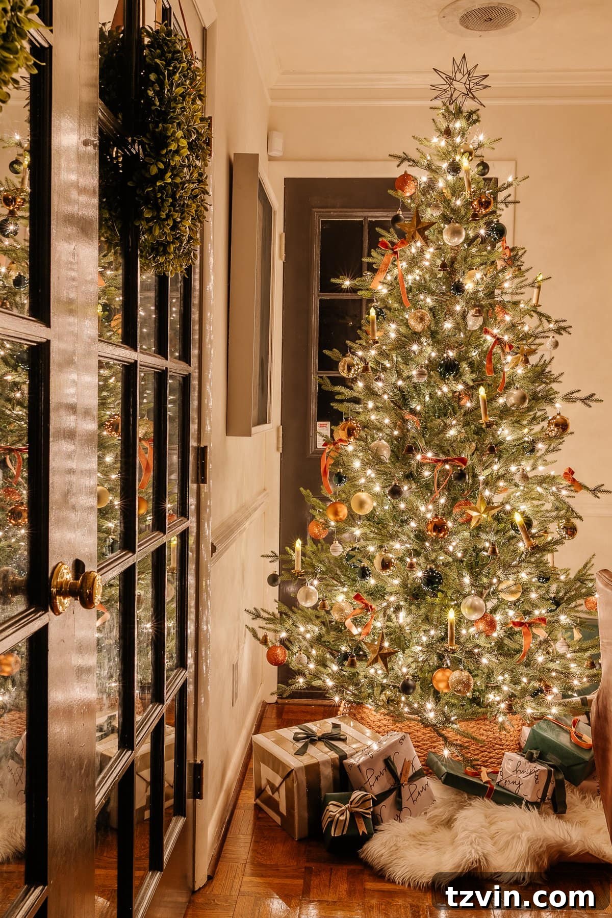 Holiday Glow Home Showcase 30 A dazzling candlelight Christmas tree at night, its ornaments reflecting the gentle light and creating a focal point of festive beauty.