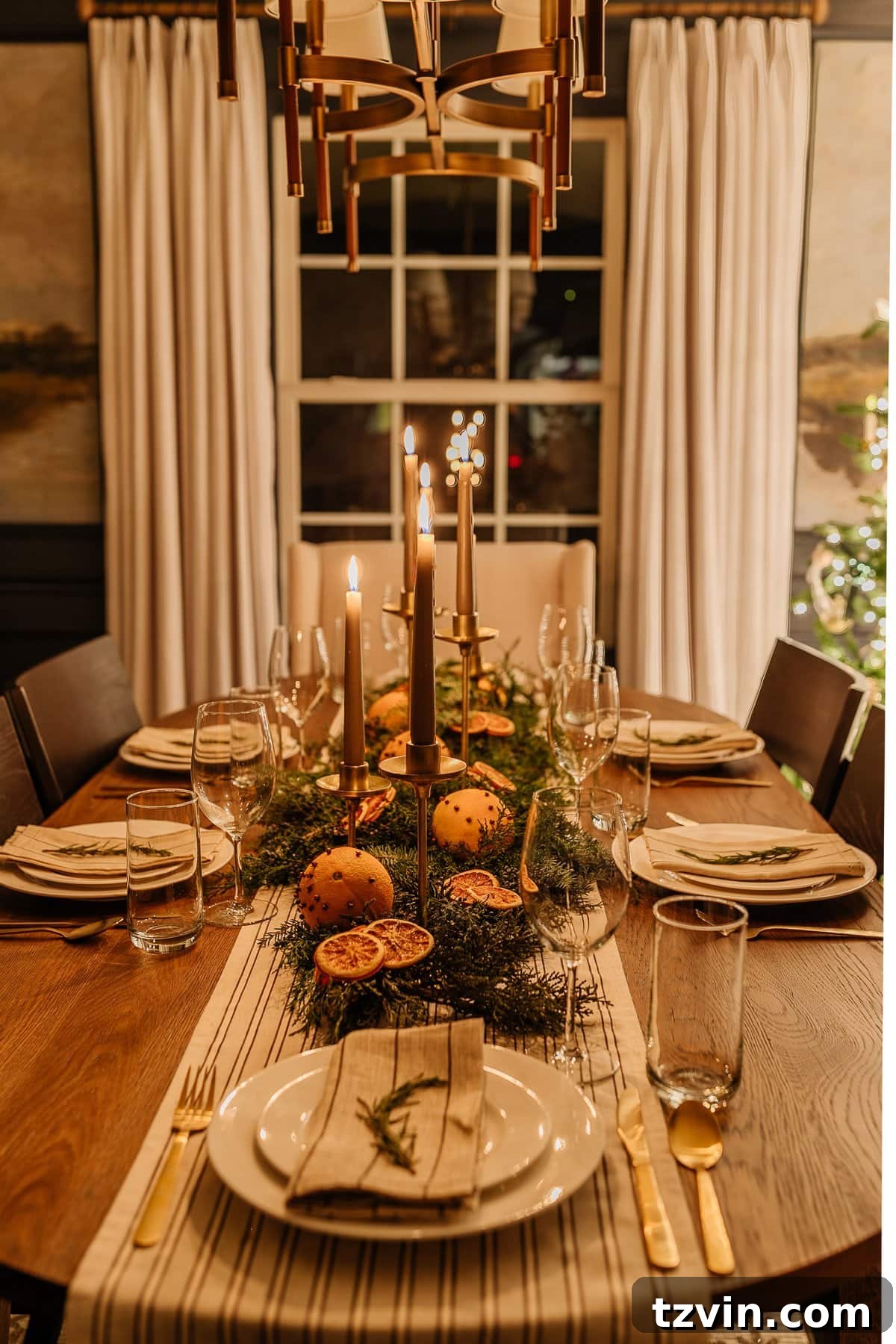 Holiday Glow Home Showcase 10 Another view of the enchanting Christmas dining room table decor at night, highlighted by the soft glow of candlelight.