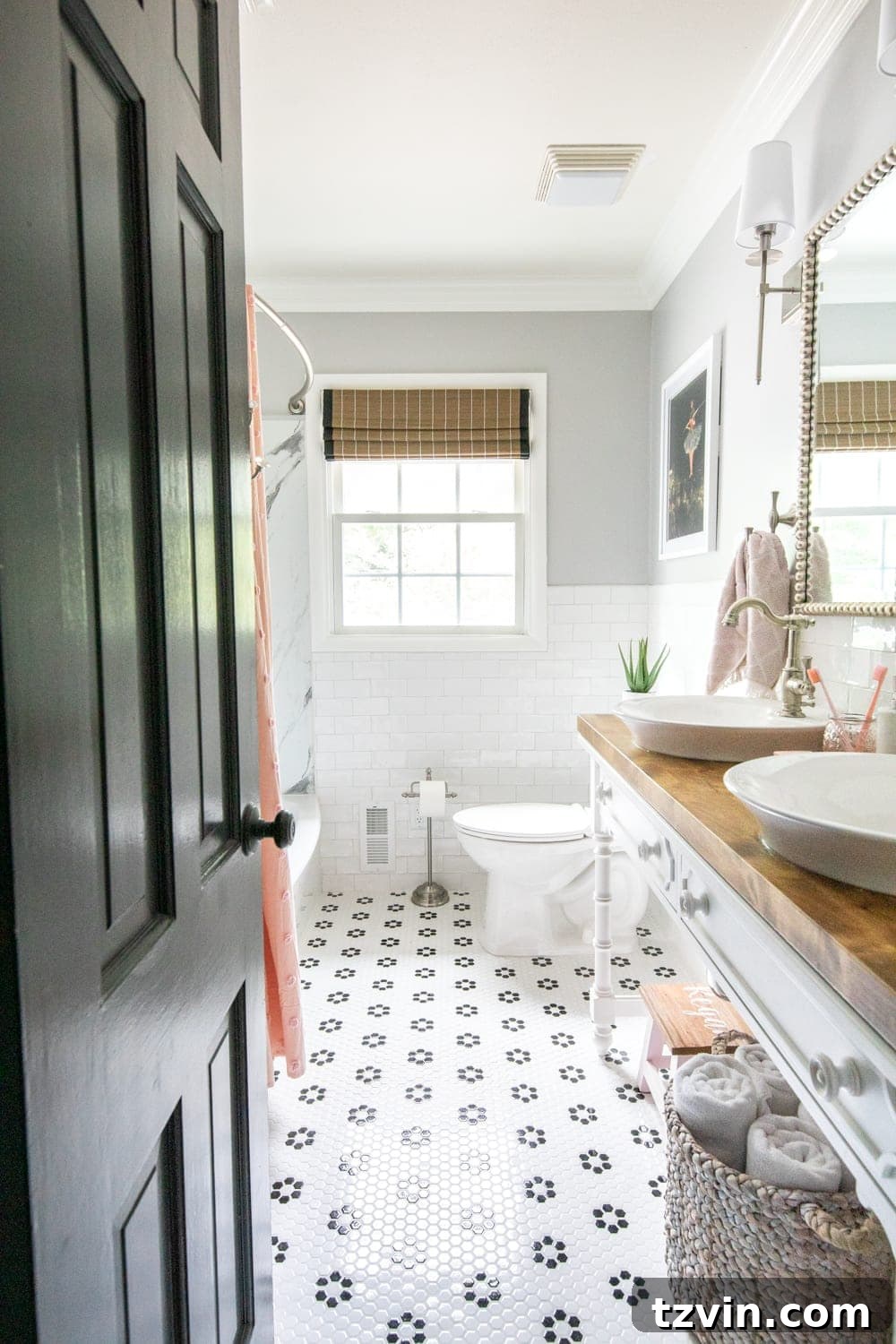 Our Favorite 21 Room Makeovers of 2021 27 Before image of the hallway bathroom, showing its previous decor.