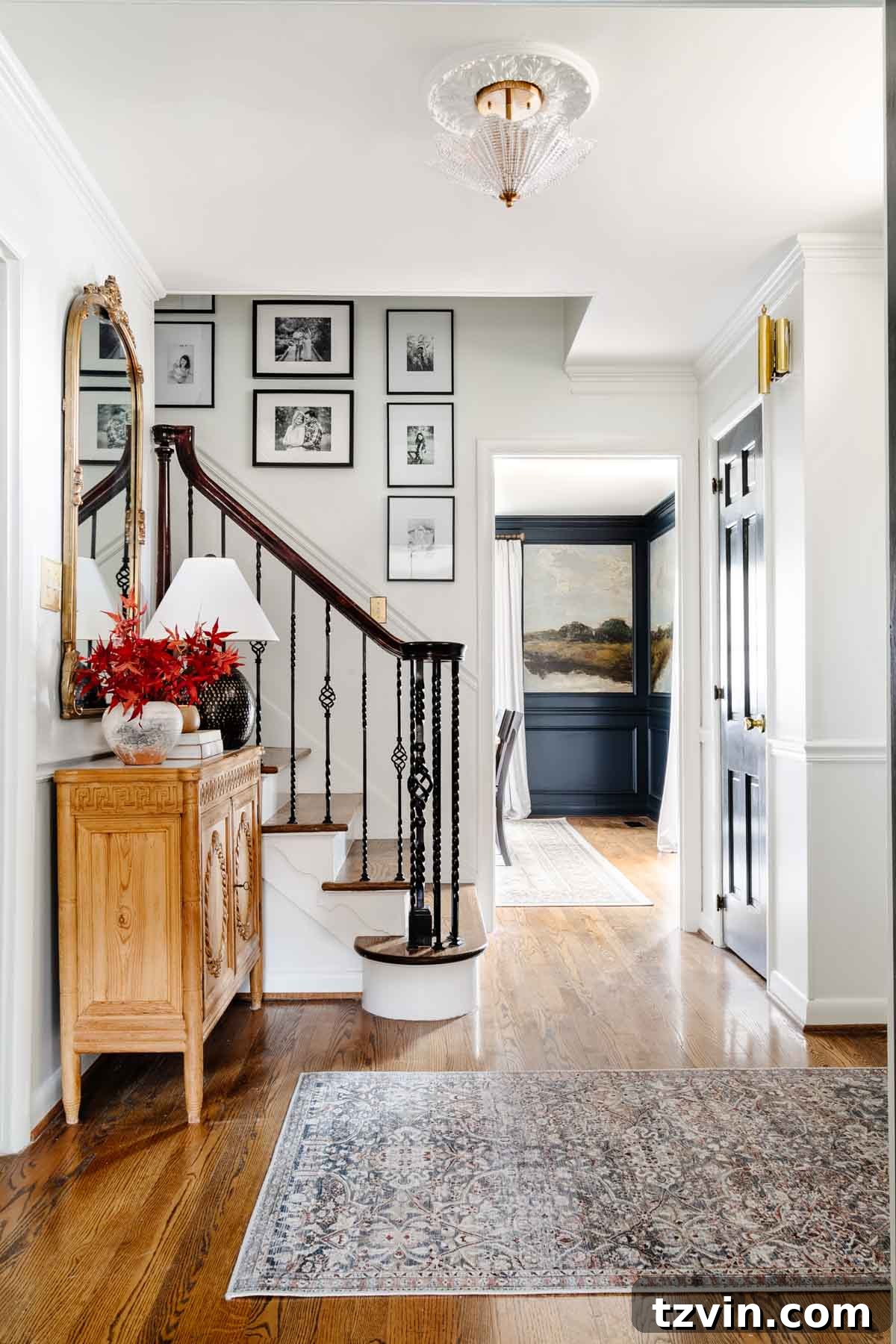Our Favorite 21 Room Makeovers of 2021 36 After image of the foyer makeover, showing a brighter and more welcoming space.