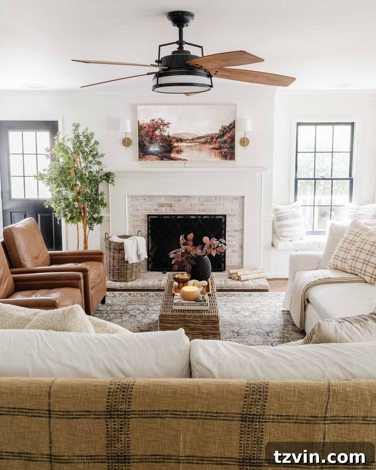 Our Favorite 21 Room Makeovers of 2021 40 After image of the living room spruce-up, featuring new Pottery Barn sofas.