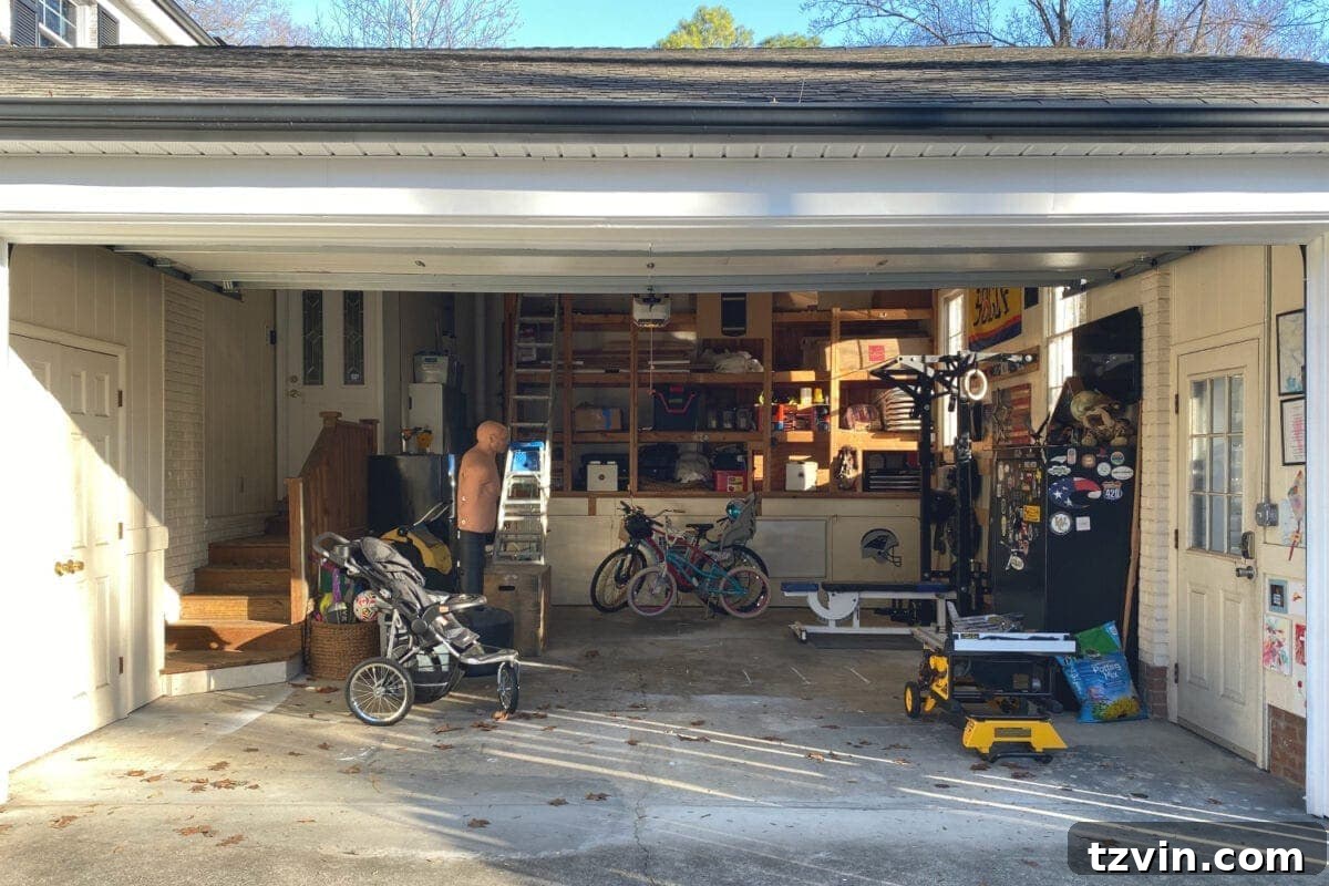 2022 Home Project Planning Your Feedback Is Key 8 The current state of the garage, showing disorganization and cluttered space.