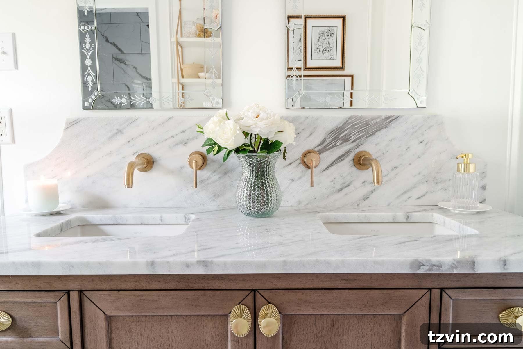 Scalloped marble bathroom backsplash and wood vanity