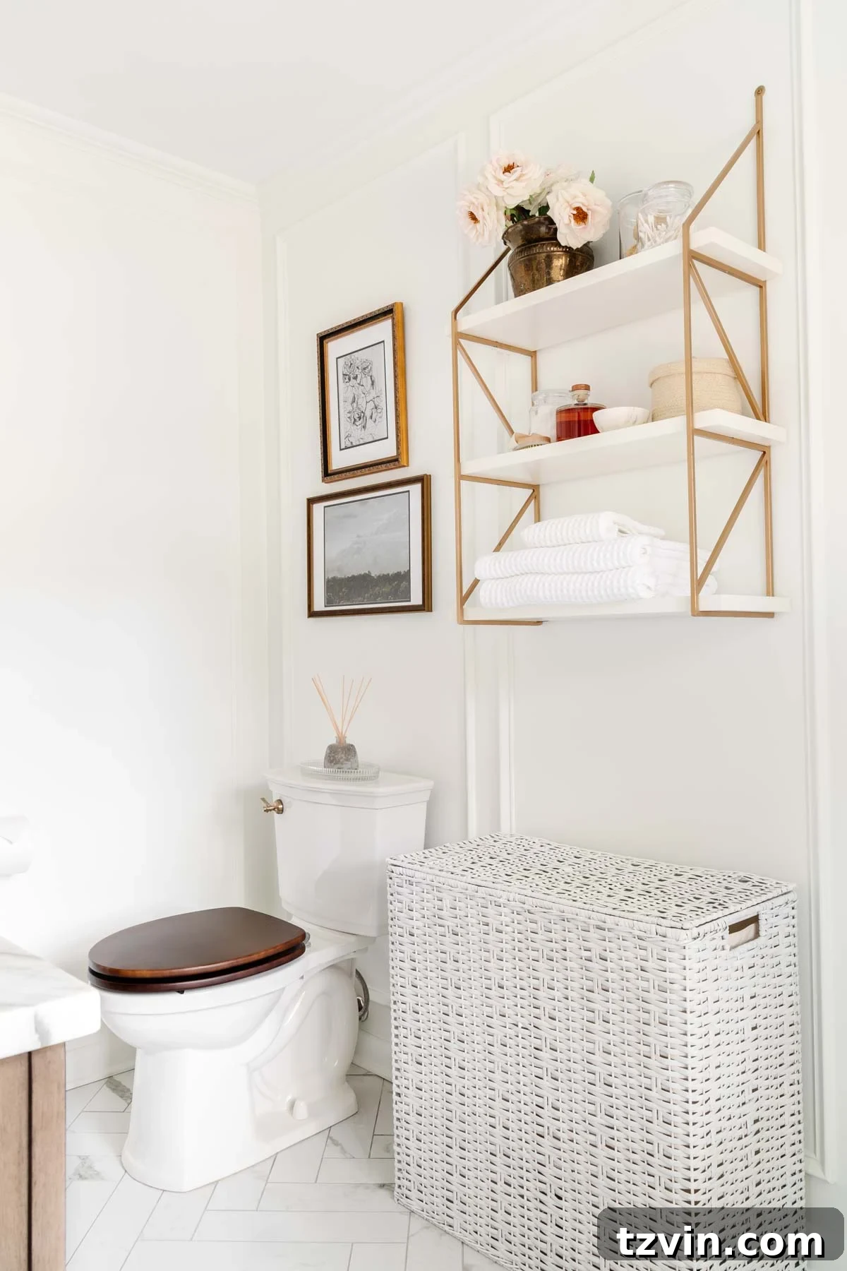 Picture frame molding in a bathroom with wall shelves and toilet with wood toilet seat