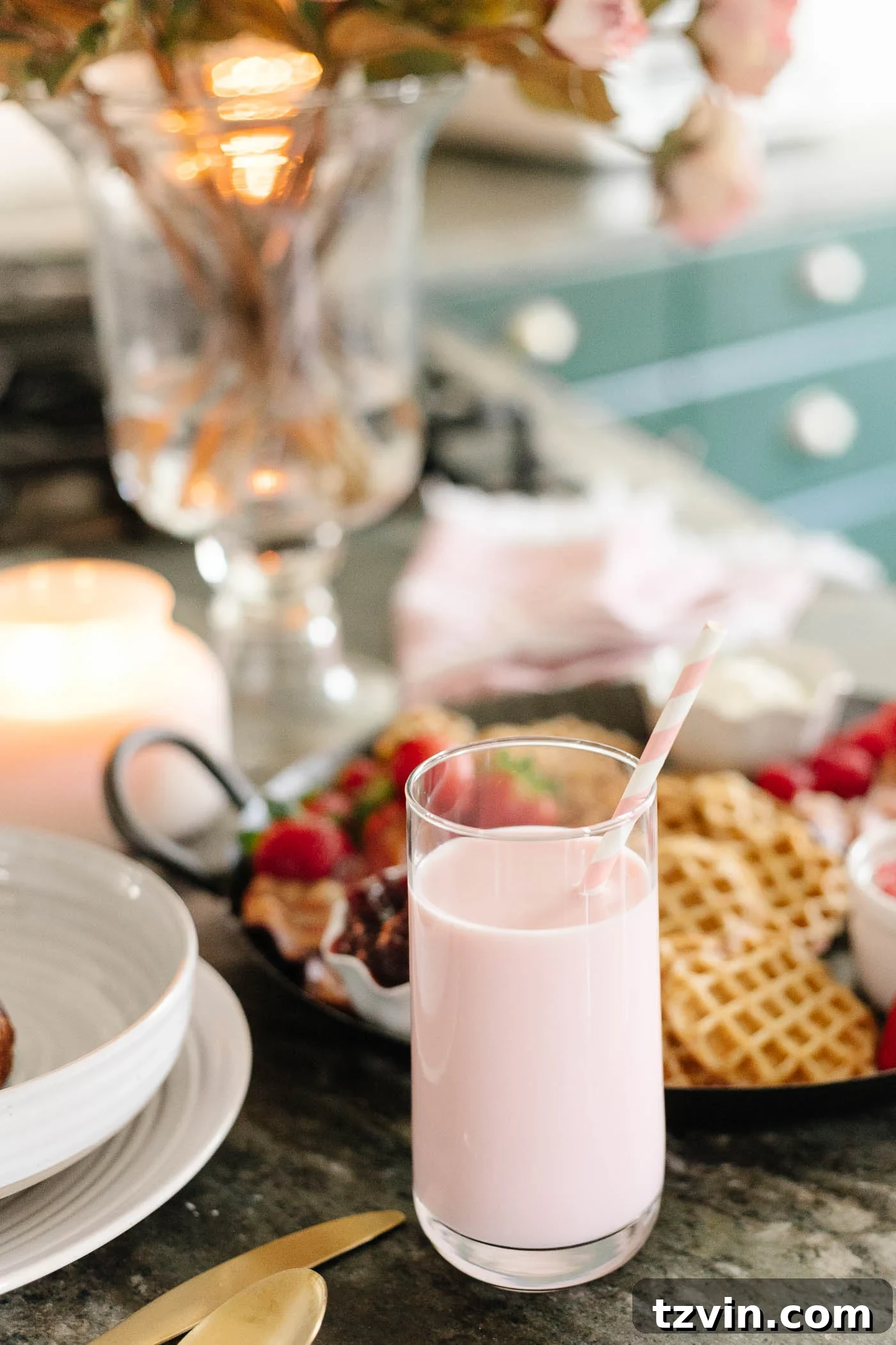 Romantic Morning Feast Board 10 Valentine's Day breakfast idea for kids - strawberry milk with pink straws