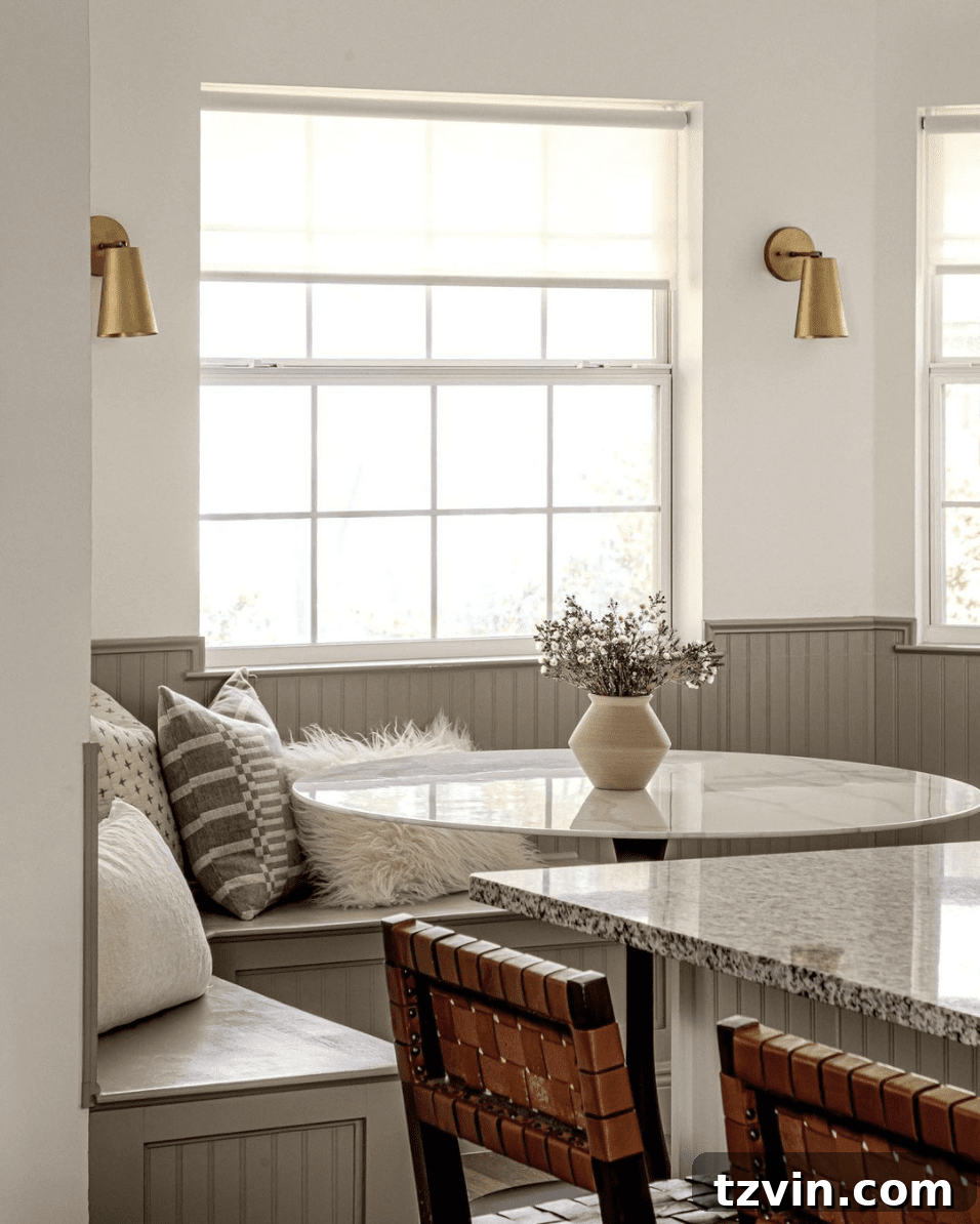 Dining nook with charming beadboard paneling adding character and easy cleaning