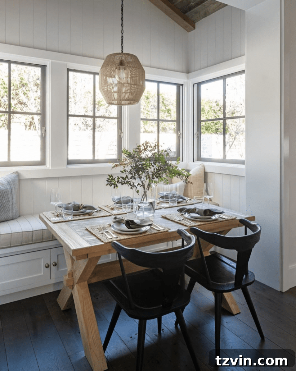 Banquette with functional cabinet doors for easy storage access in a breakfast nook