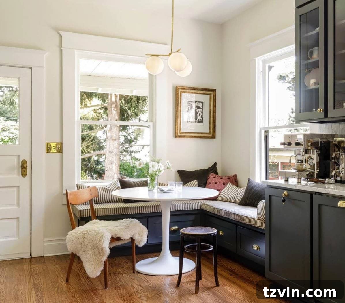 Dining banquette with built-in storage drawers for functional breakfast nook