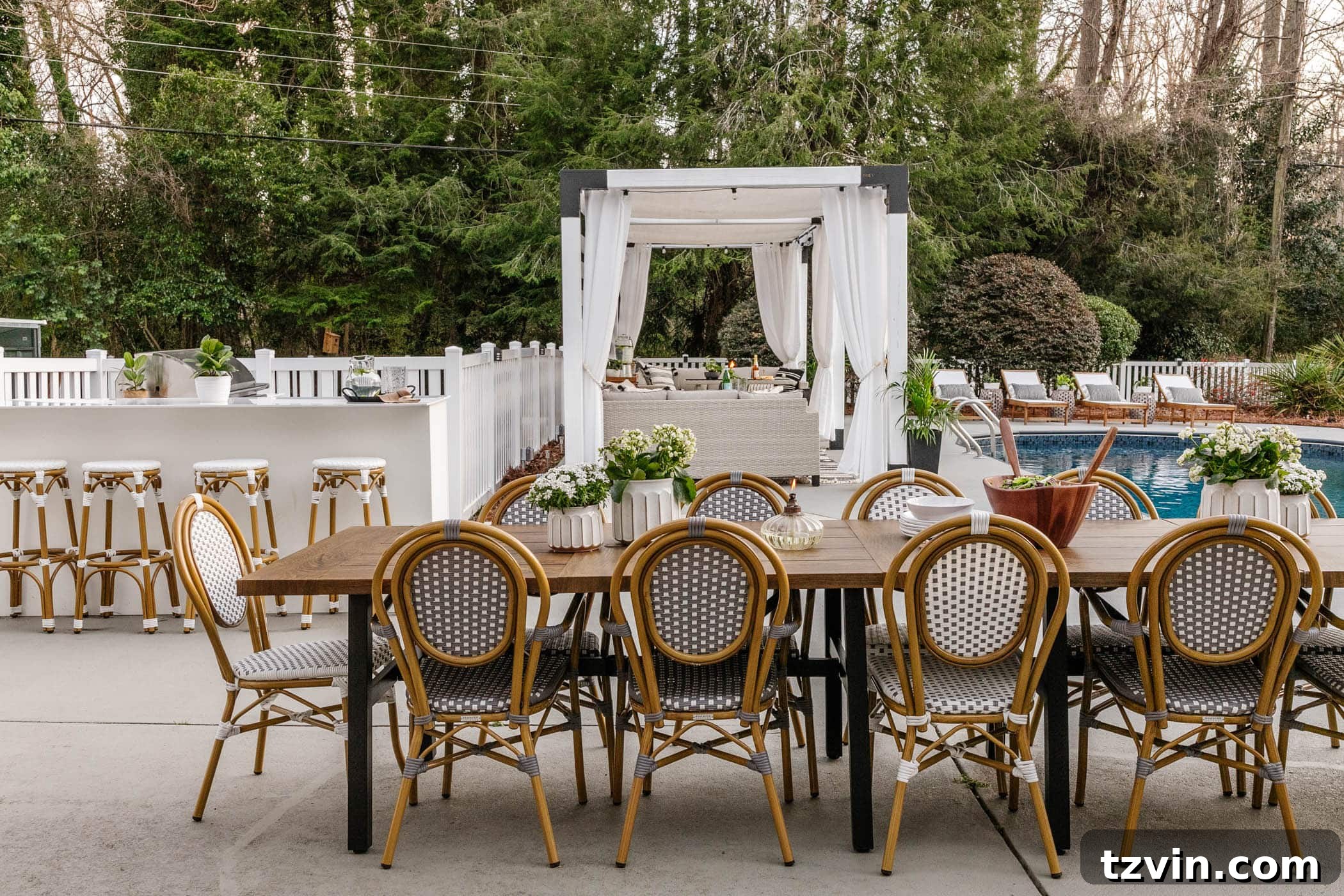 backyard swimming pool makeover showing a beautifully renovated space with new Better Homes and Gardens patio furniture