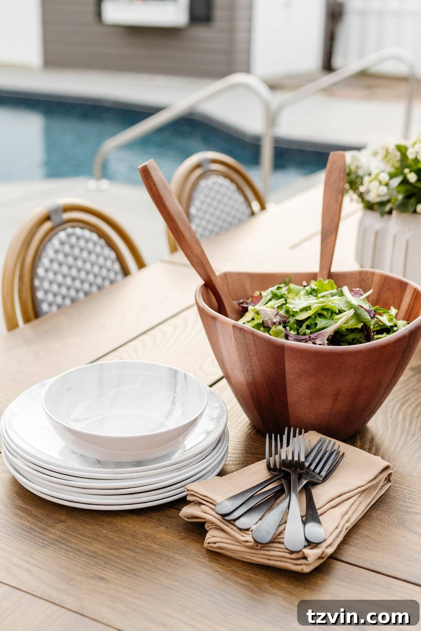 Beautiful Better Homes and Gardens outdoor decor and marble-look melamine dinnerware on a patio table, highlighting sustainable outdoor dining