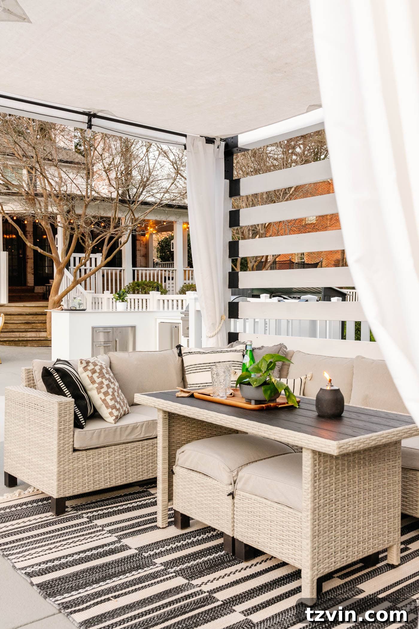 Closeup of the Better Homes and Gardens outdoor dining sectional with convenient tucked-under stools for extra seating