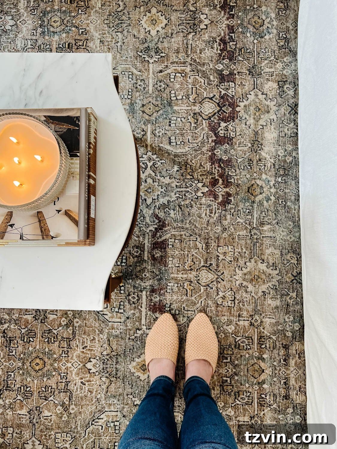 A stylish living room with an affordable, modern rug anchoring the space, demonstrating where to buy cheap rugs online for home decor.