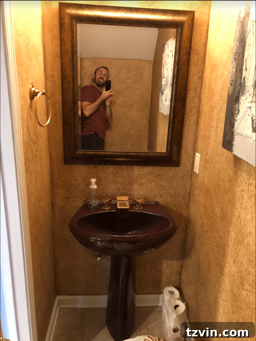 Sleek Compact Powder Room for the Modern Gentleman 3 powder room before