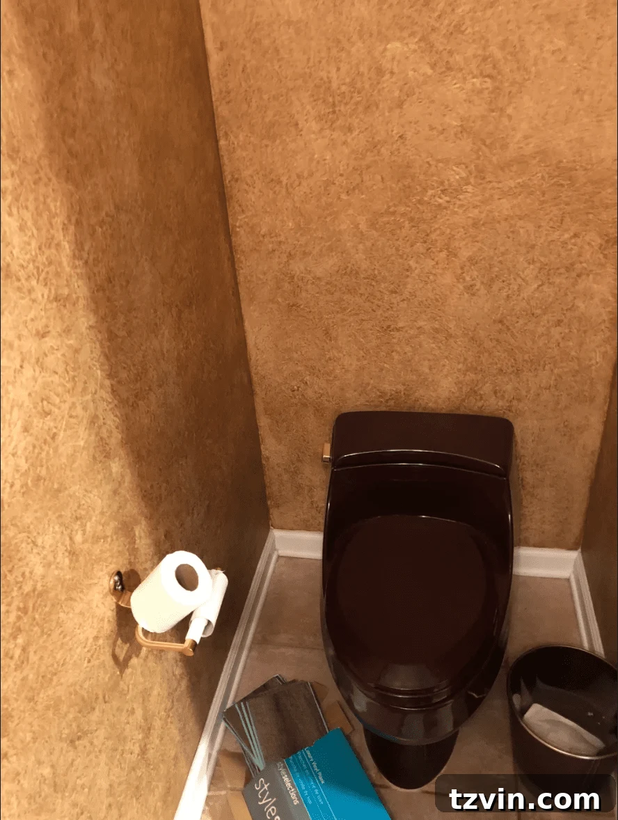 Sleek Compact Powder Room for the Modern Gentleman 5 powder room before