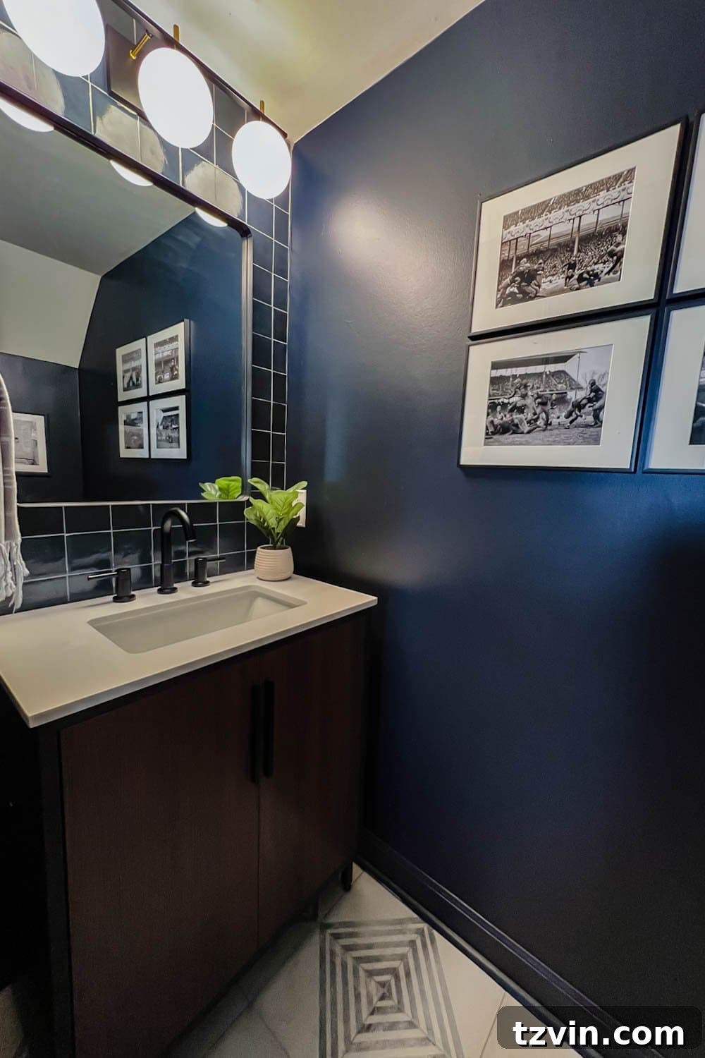 Sleek Compact Powder Room for the Modern Gentleman 7 vintage football art prints in a masculine bachelor pad powder room