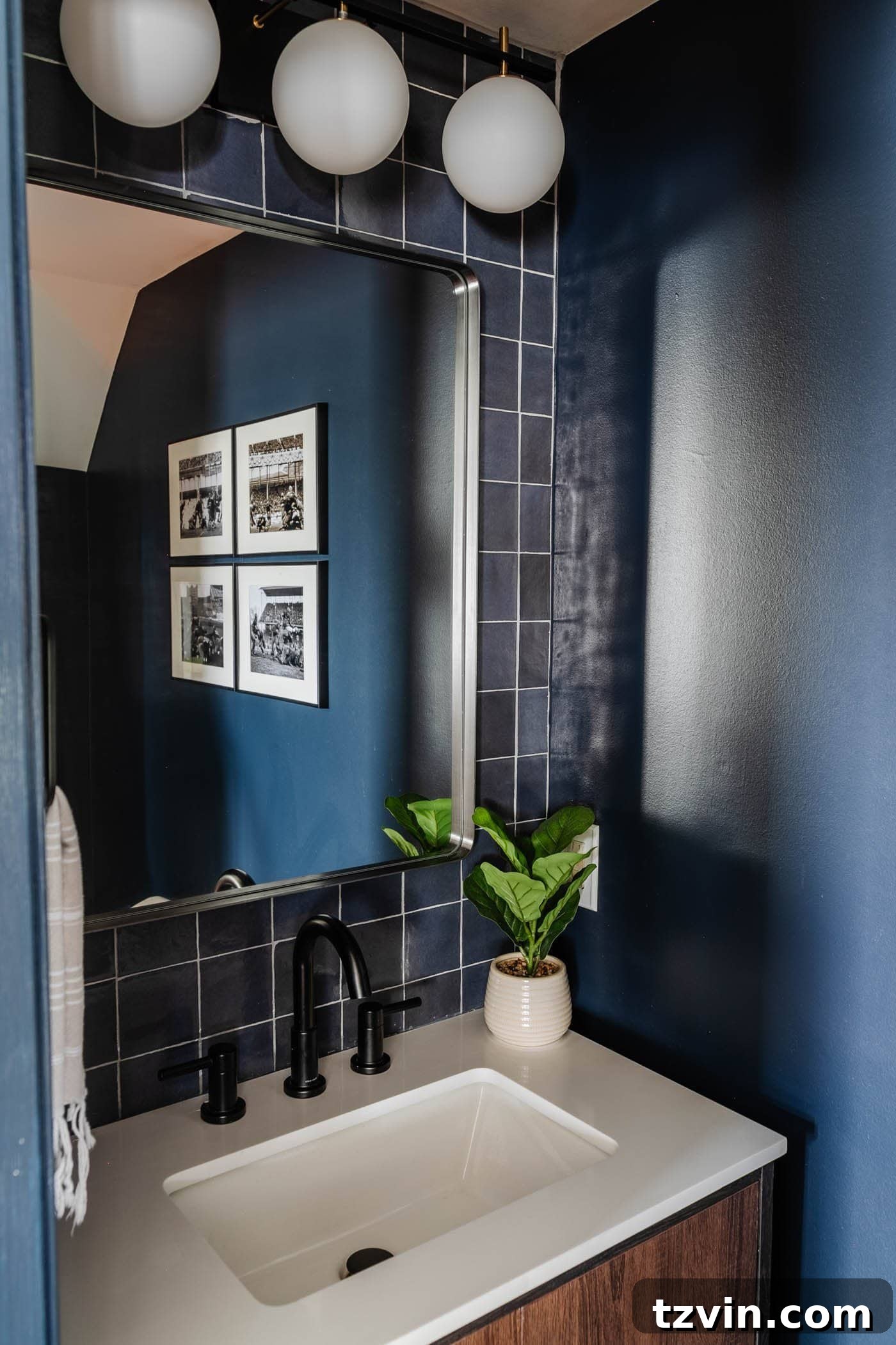 Sleek Compact Powder Room for the Modern Gentleman 8 using stacked tile on a wall for a modern style focal point behing a vanity