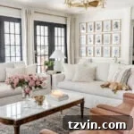 Our Top-Rated Fandelier Favorites 8 Custom gold spray painted chandelier fan in a stylish living room with pristine white walls and elegant black French doors, a statement piece.