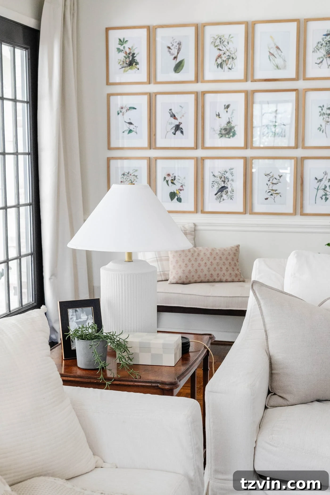 30 Budget Secrets to a Million-Dollar Home Aesthetic 21 how to make your house look expensive - swap your lamp shades - living room end table decor with a lamp and empire lamp shade