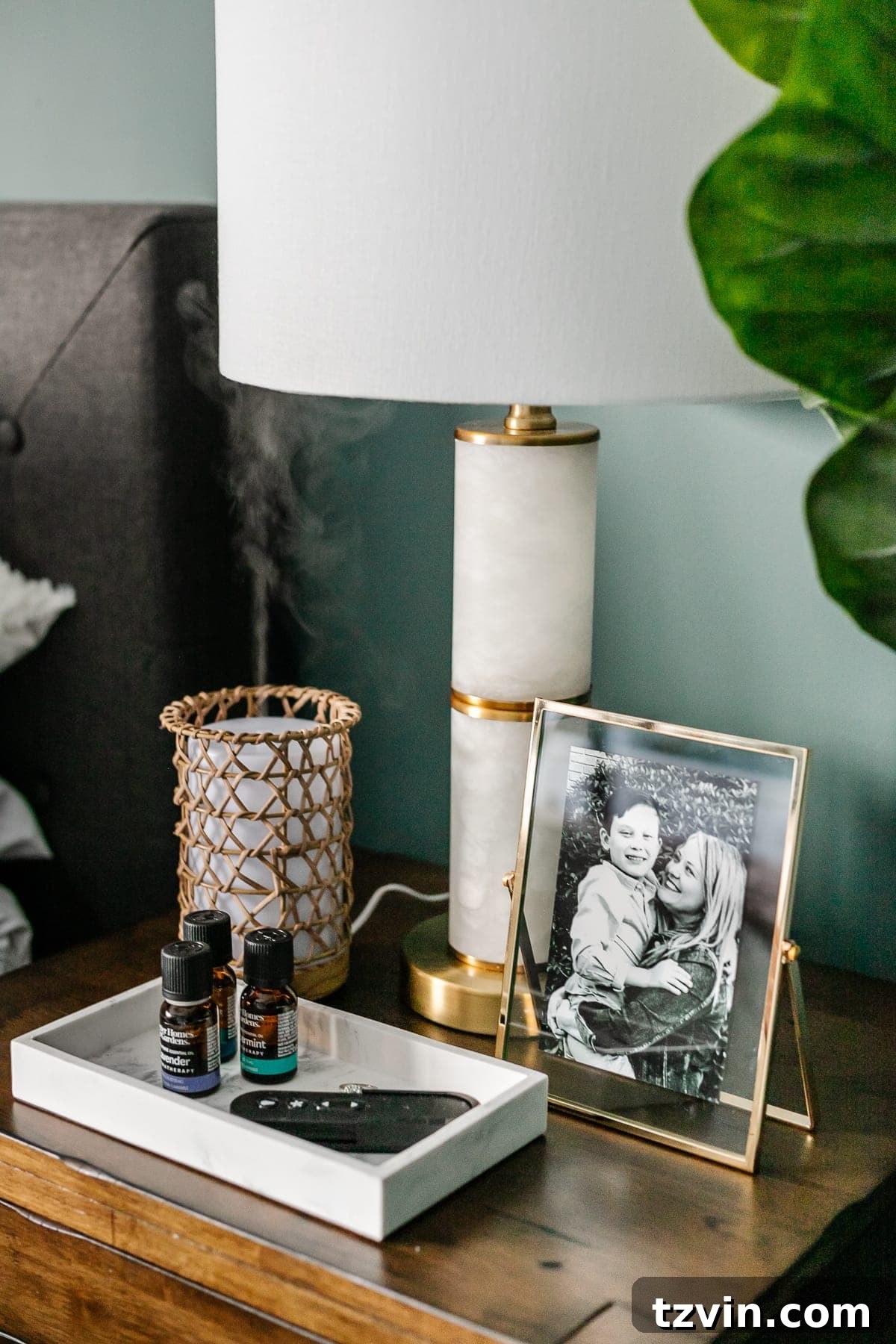 30 Budget Secrets to a Million-Dollar Home Aesthetic 27 how to make your house look expensive - be mindful of your home's scent - diffuser on a nightstand with nightstand decor