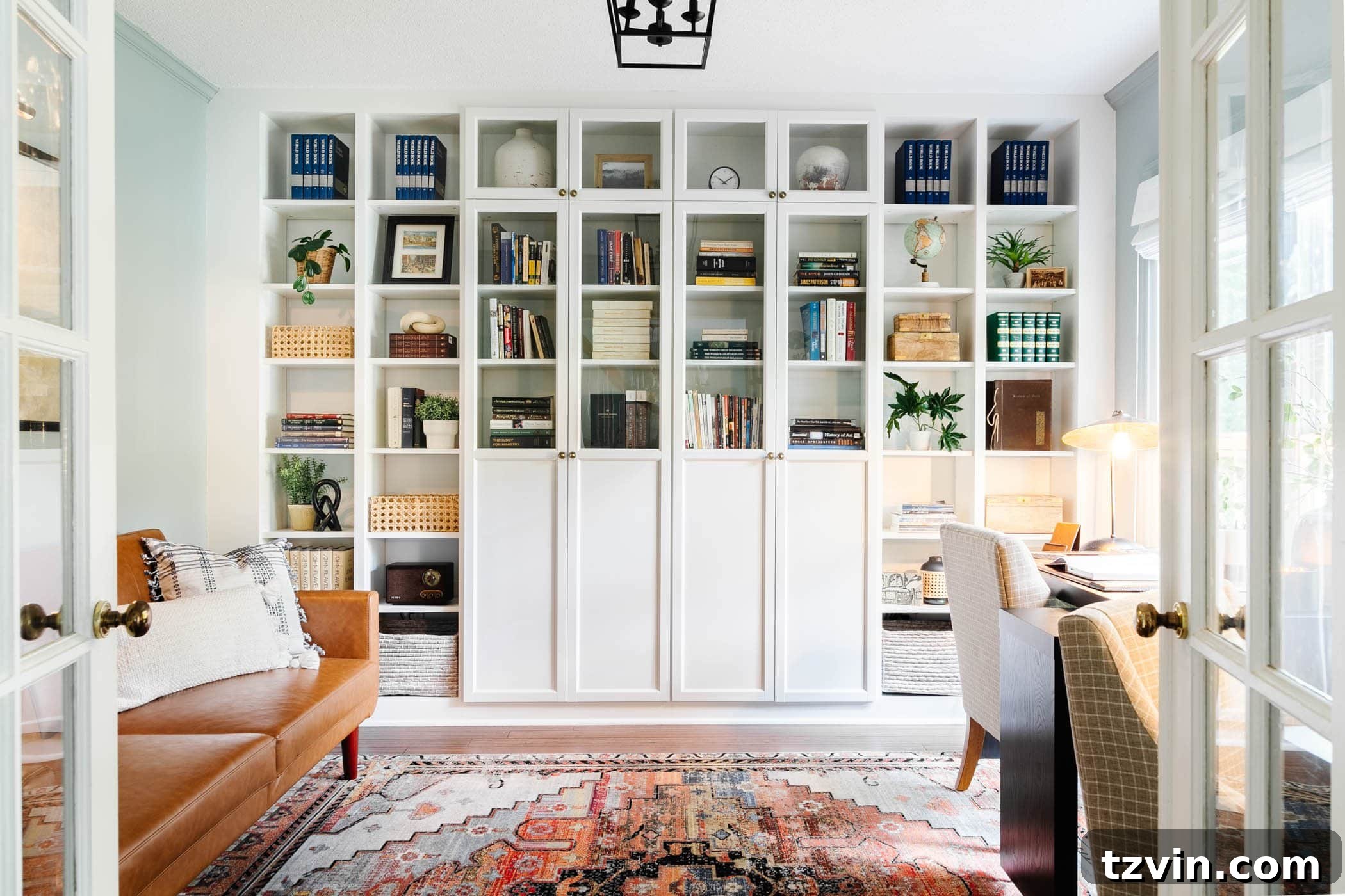 Contemporary home office setup with IKEA Billy bookcase shelving and ample natural light, designed for maximum productivity and organization.