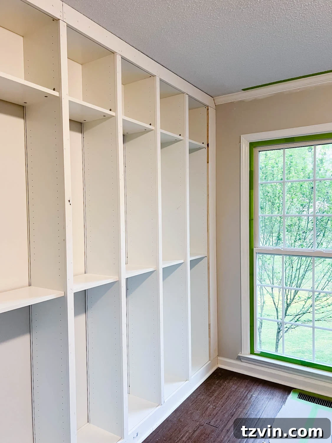 Building Custom Bookshelves with IKEA Billy Bookcase Hacks 21 added 1x2 boards to the fronts of bookcases to hide the cracks where they meet