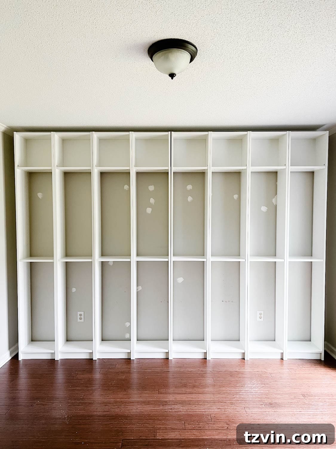 assembled IKEA Billy bookcases ready to make into built in bookshelves