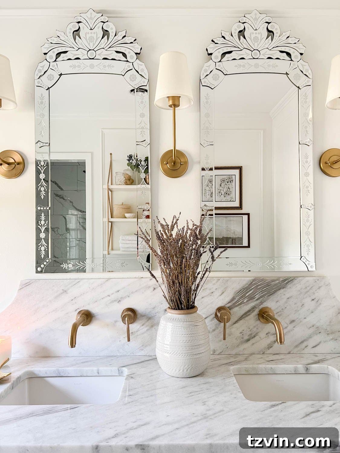 Attainable Luxury: Spa Bathroom Ideas for Every Home 11 Venetian mirrors, shaded sconces, and lavender in a vase for spa bathroom decor