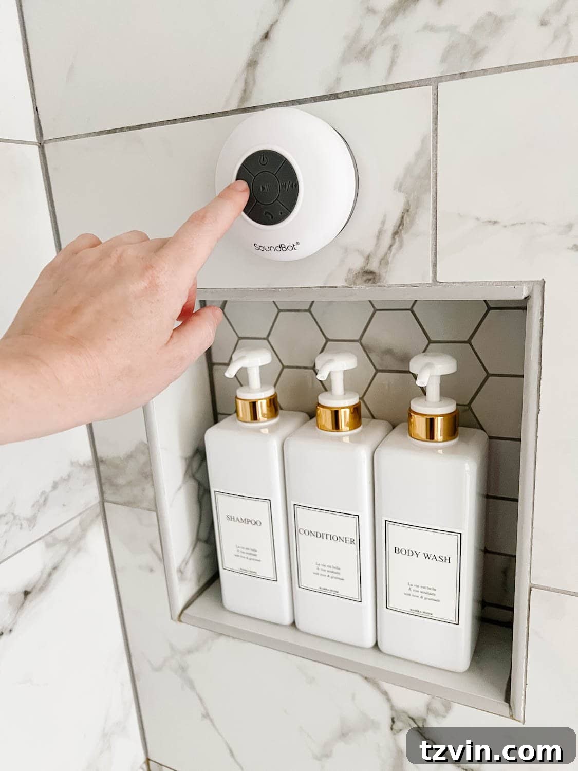 Attainable Luxury: Spa Bathroom Ideas for Every Home 4 bluetooth shower speaker and matching soap dispensers to create a spa bathroom experience