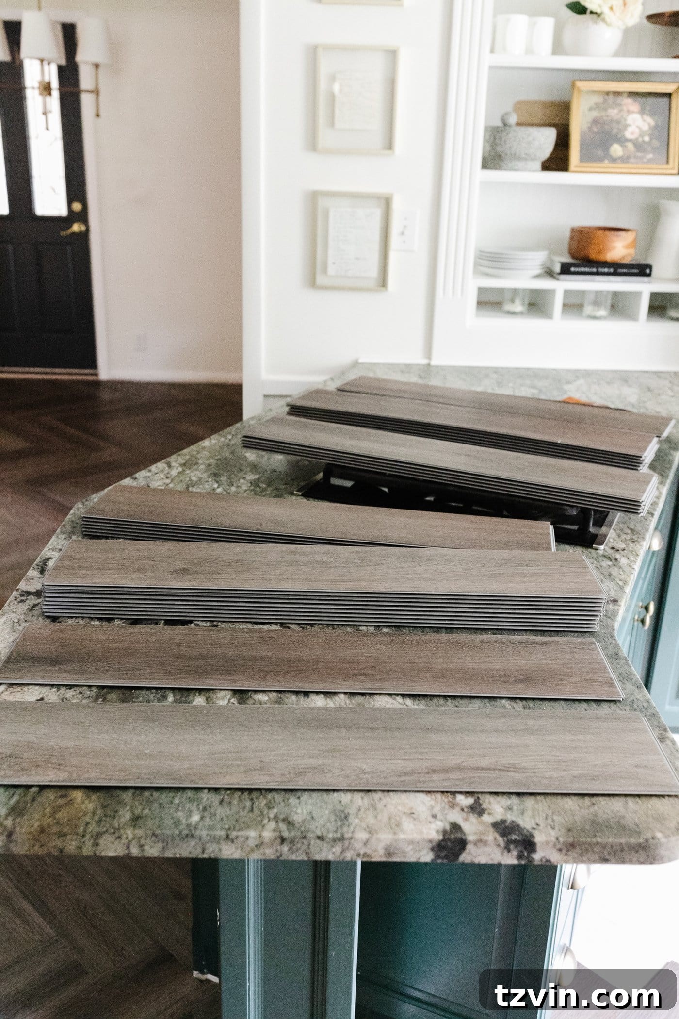 LVP flooring stacked to vary designs and patterns during installation